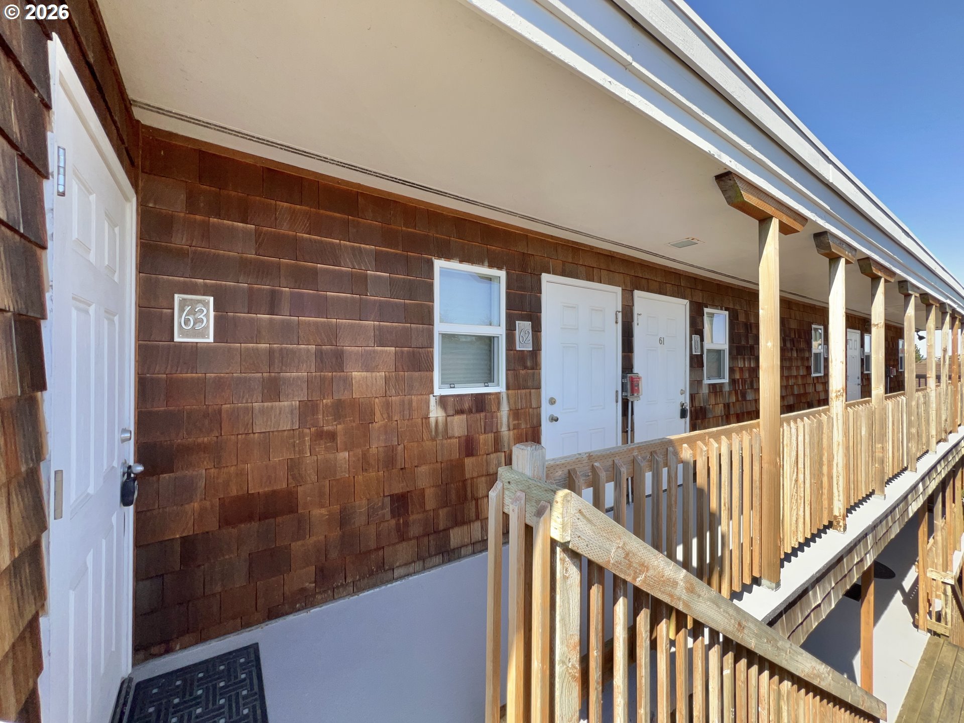 40 Avenue U, Unit 63 Seaside, OR 97138 - Photo 32 of 45 a view of balcony with small stairs