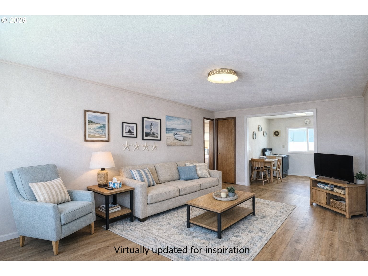 40 Avenue U, Unit 63 Seaside, OR 97138 - Photo 7 of 45 a living room with furniture a wooden floor and a flat screen tv