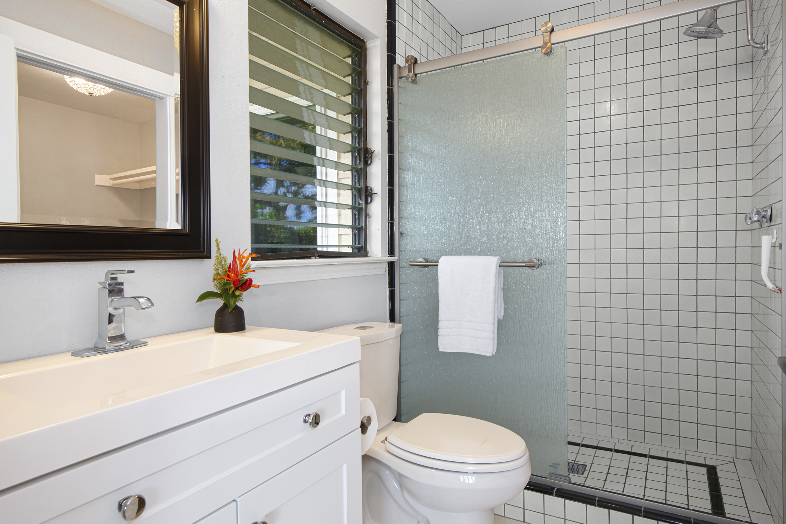 2750 Milo Hae Loop Koloa, HI 96756 - Photo 17 of 23 a bathroom with a sink toilet and shower