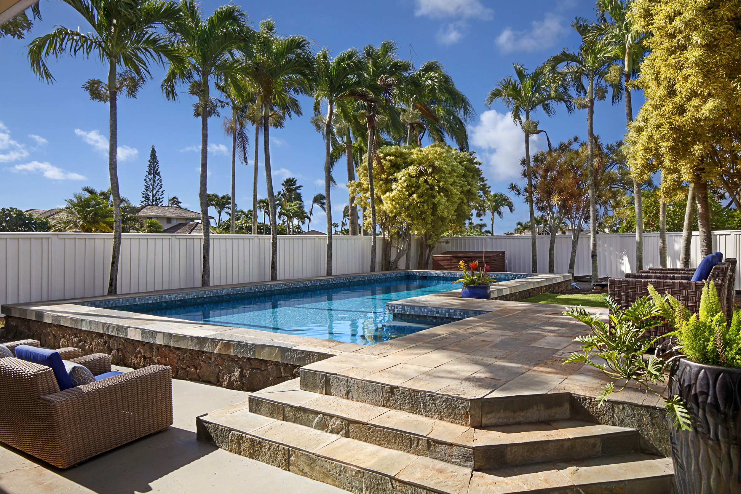 2750 Milo Hae Loop Koloa, HI 96756 - Photo 21 of 23 a view of a backyard with couches and a fire pit