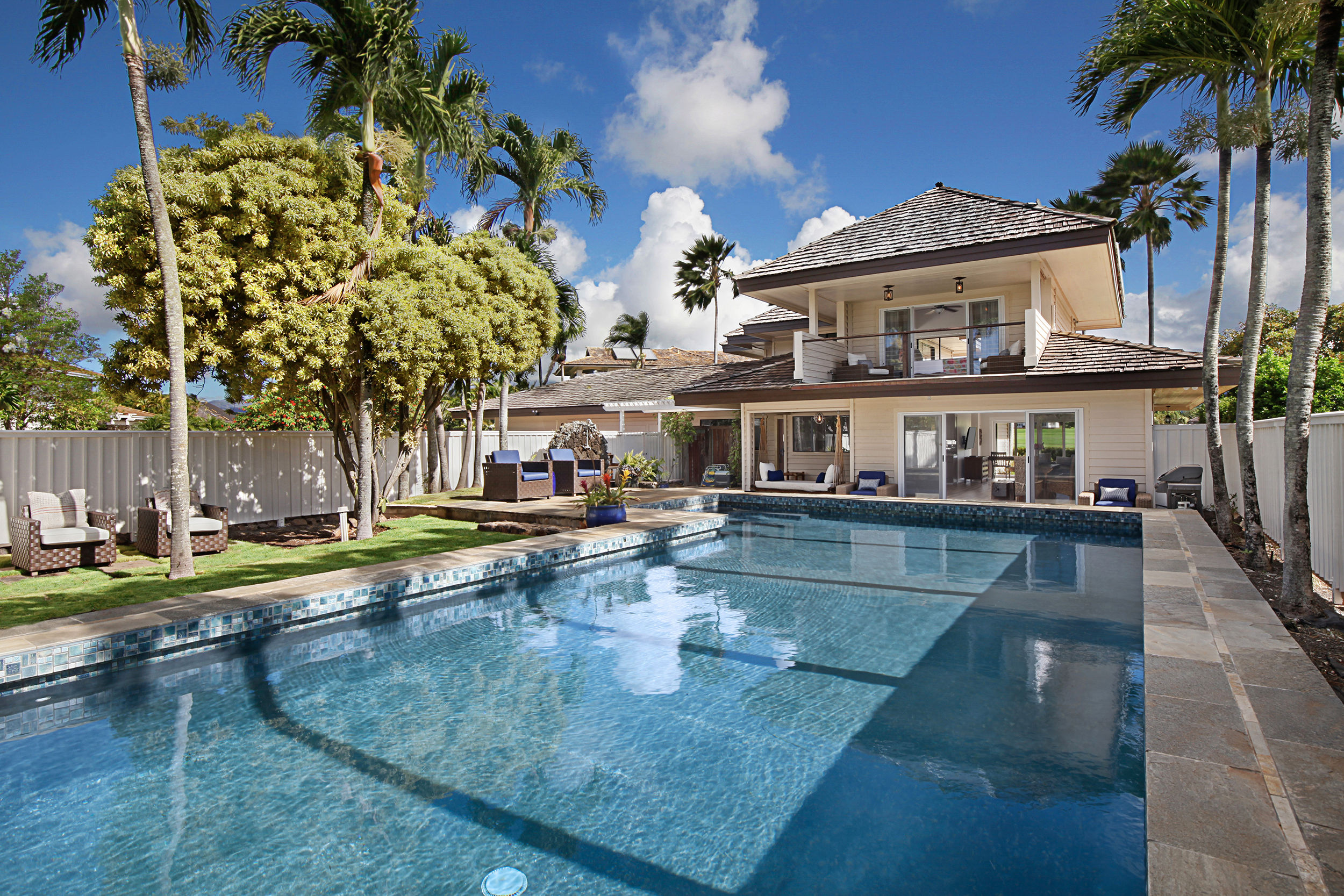2750 Milo Hae Loop Koloa, HI 96756 - Photo 7 of 23 a view of a swimming pool with a lounge chairs