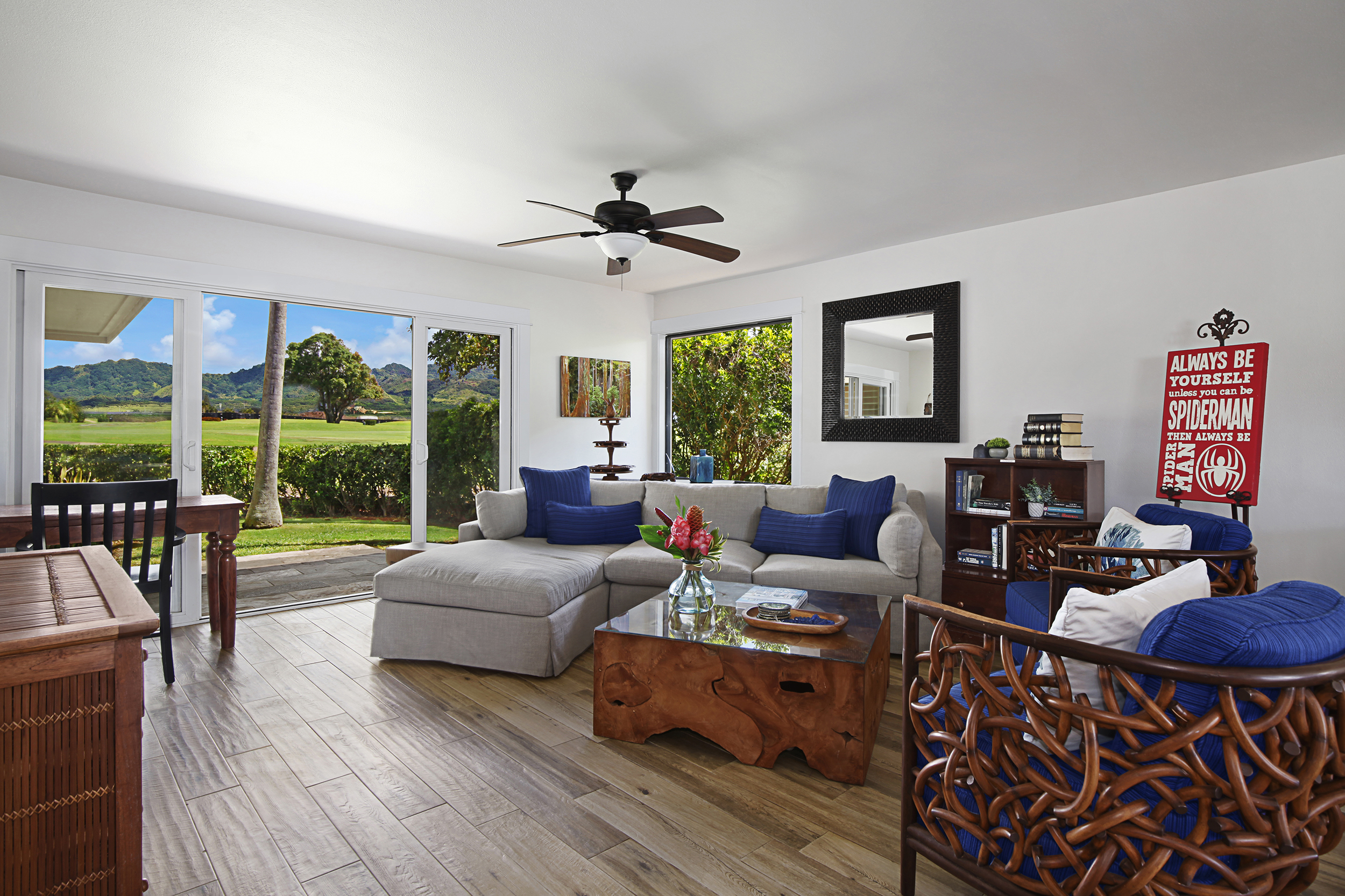 2750 Milo Hae Loop Koloa, HI 96756 - Photo 8 of 23 a living room with furniture and a floor to ceiling window