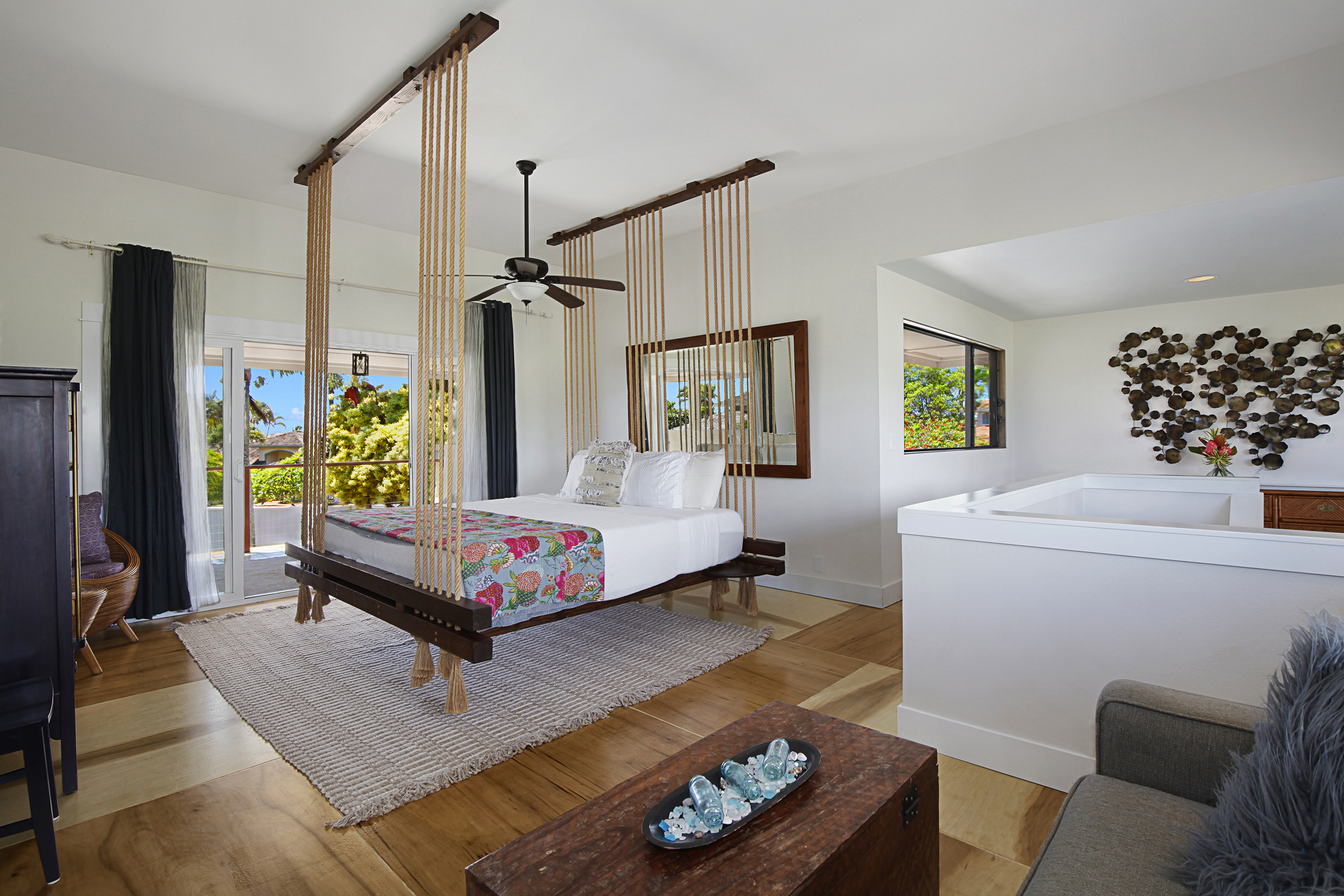 2750 Milo Hae Loop Koloa, HI 96756 - Photo 10 of 23 a living room with furniture and a flat screen tv