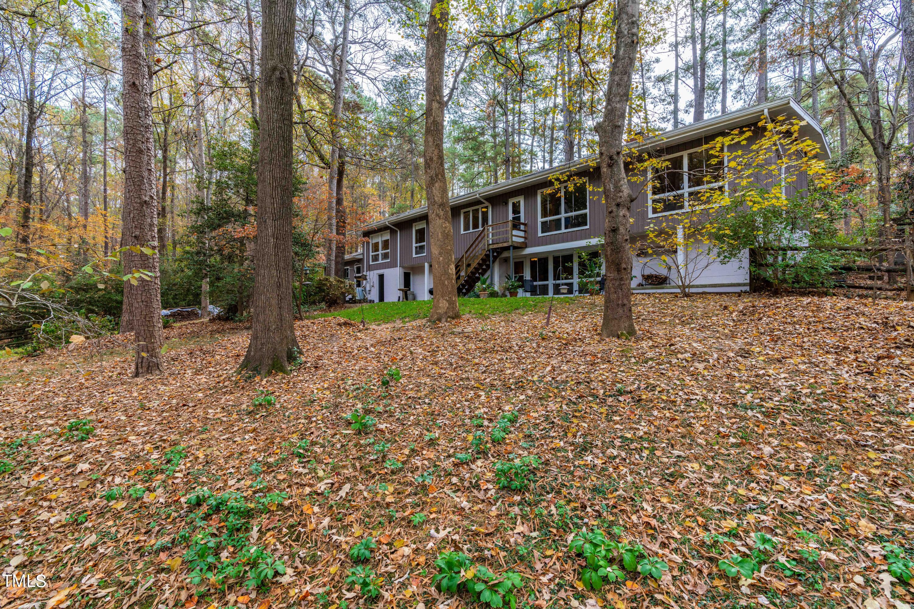 3120 Tanager Street Raleigh, NC 27606 - Photo 47 of 70 front view of a house with a yard