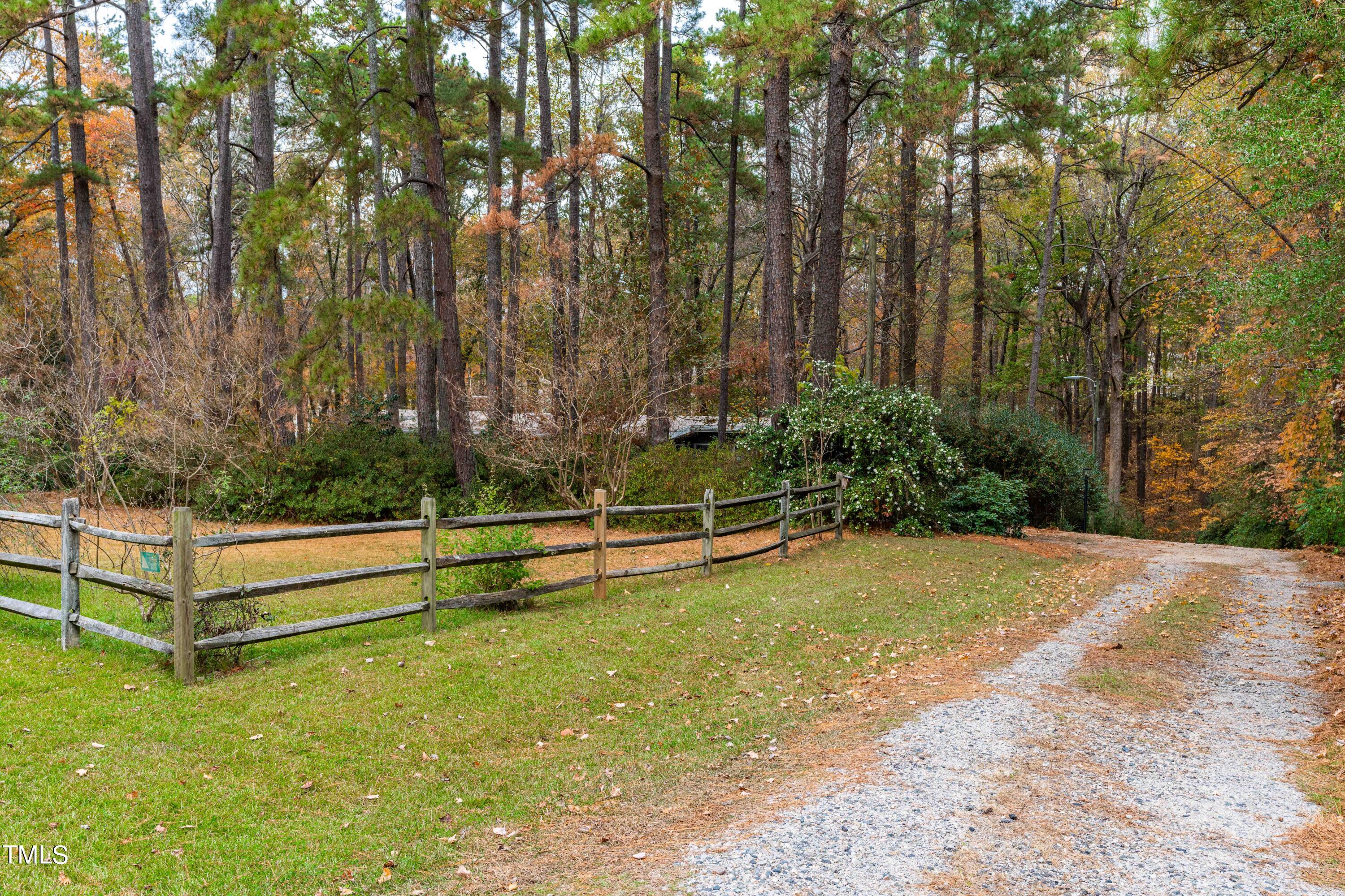 3120 Tanager Street Raleigh, NC 27606 - Photo 54 of 70 a view of outdoor space with swimming pool and trees