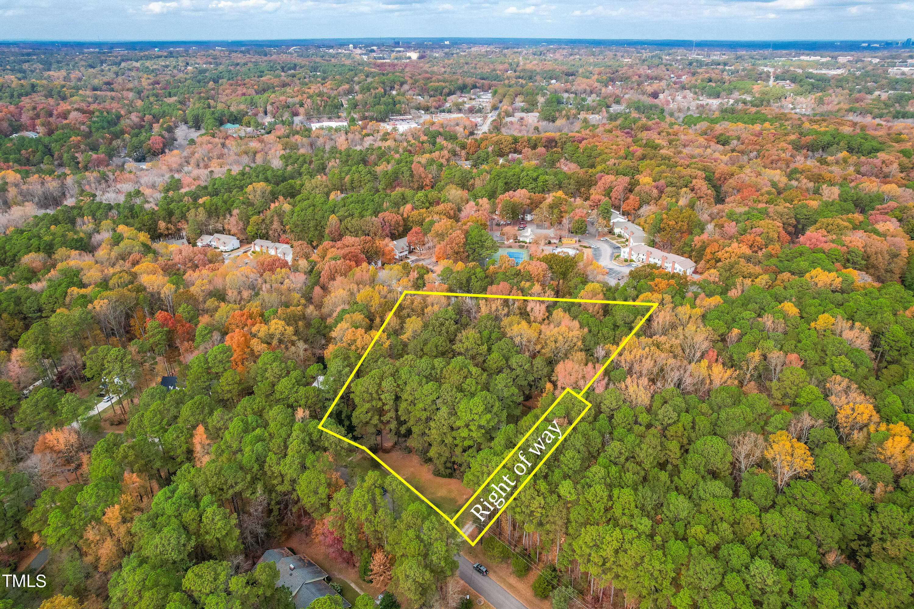 3120 Tanager Street Raleigh, NC 27606 - Photo 58 of 70 an aerial view of residential houses with outdoor space