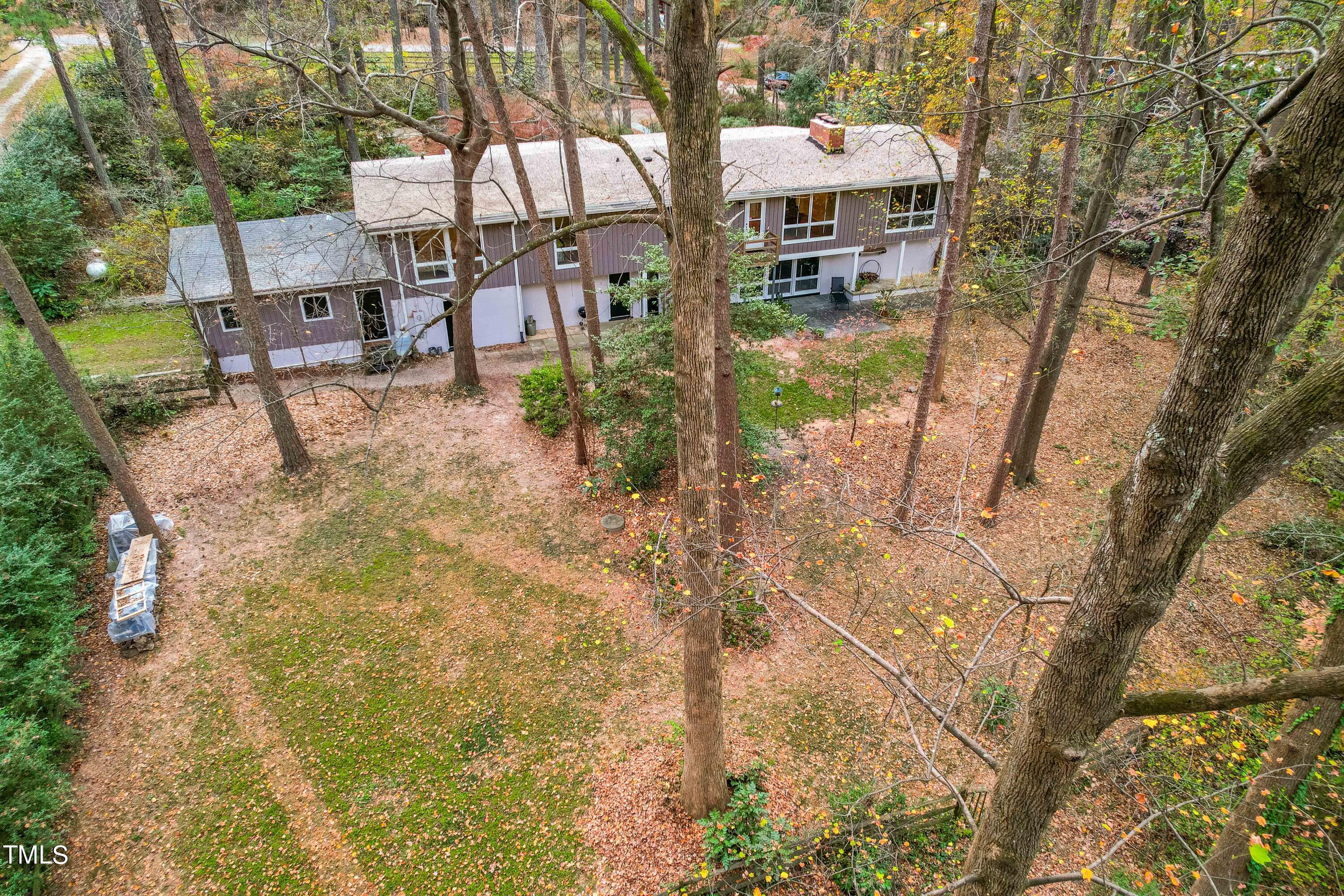 3120 Tanager Street Raleigh, NC 27606 - Photo 64 of 70 a front view of a house with a yard