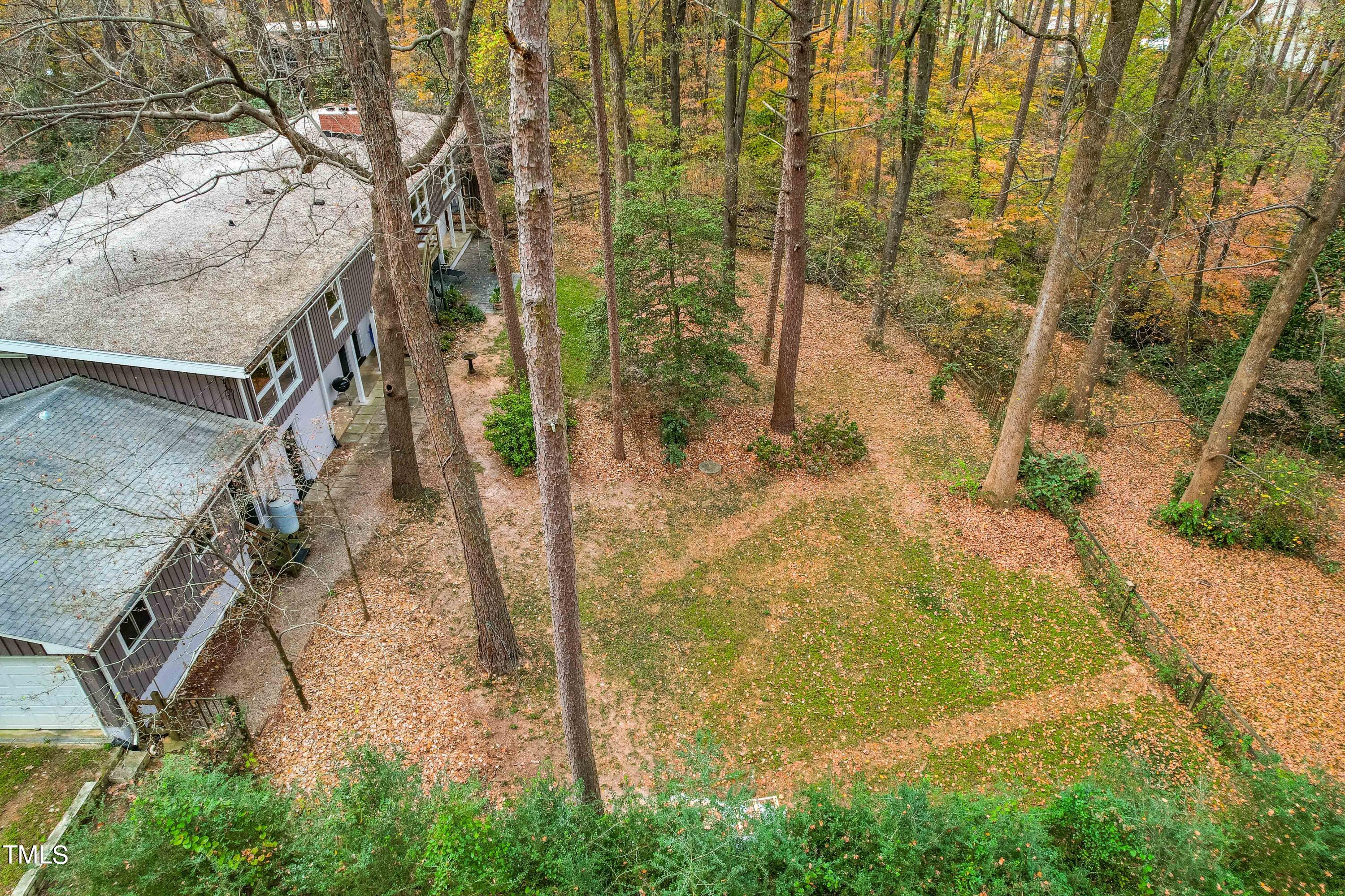 3120 Tanager Street Raleigh, NC 27606 - Photo 65 of 70 a backyard of a house with lots of green space