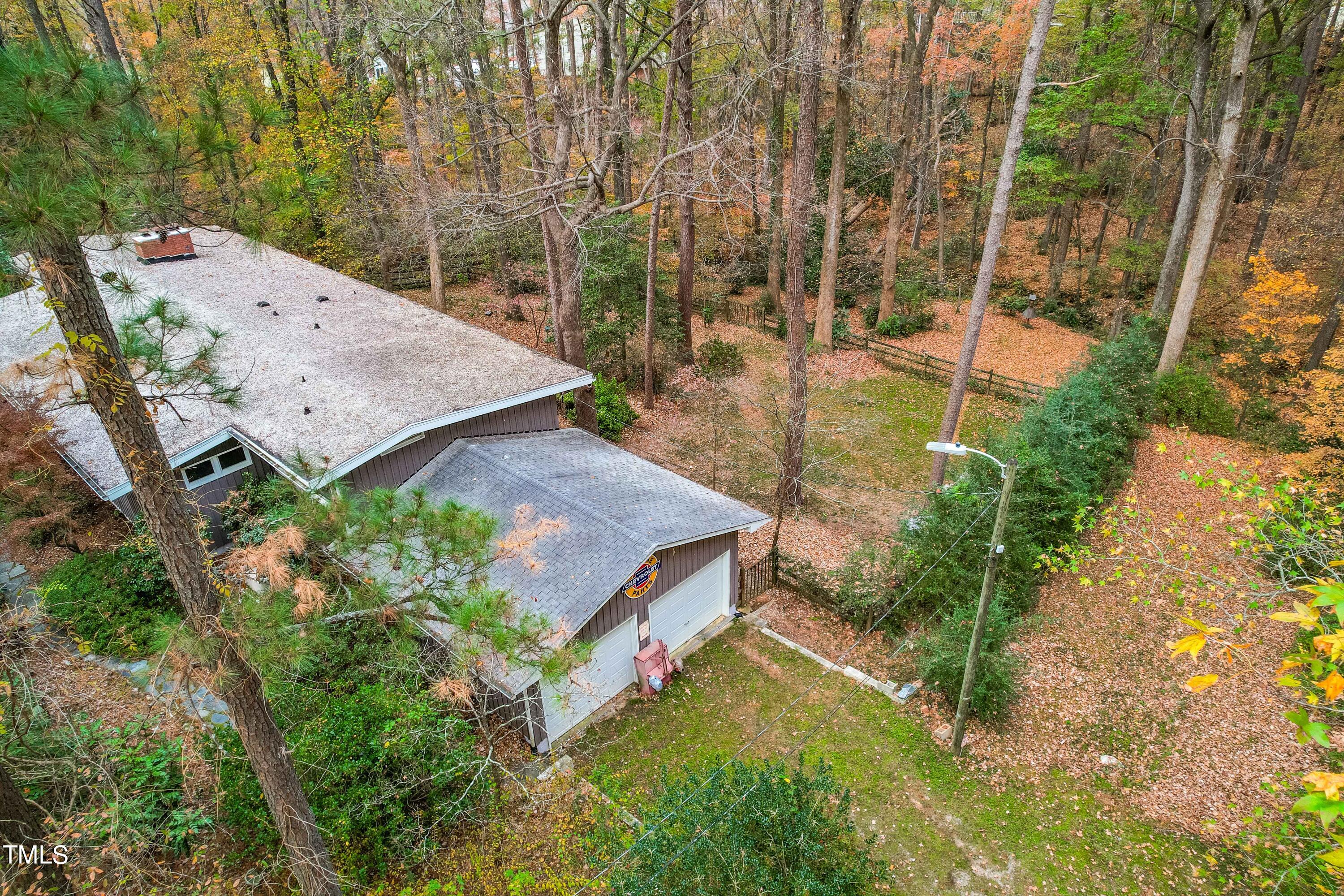 3120 Tanager Street Raleigh, NC 27606 - Photo 67 of 70 an aerial view of a house with yard swimming pool and outdoor seating