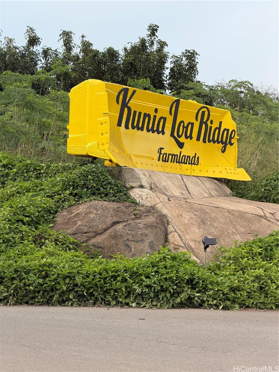 a sign that is on the side of a road