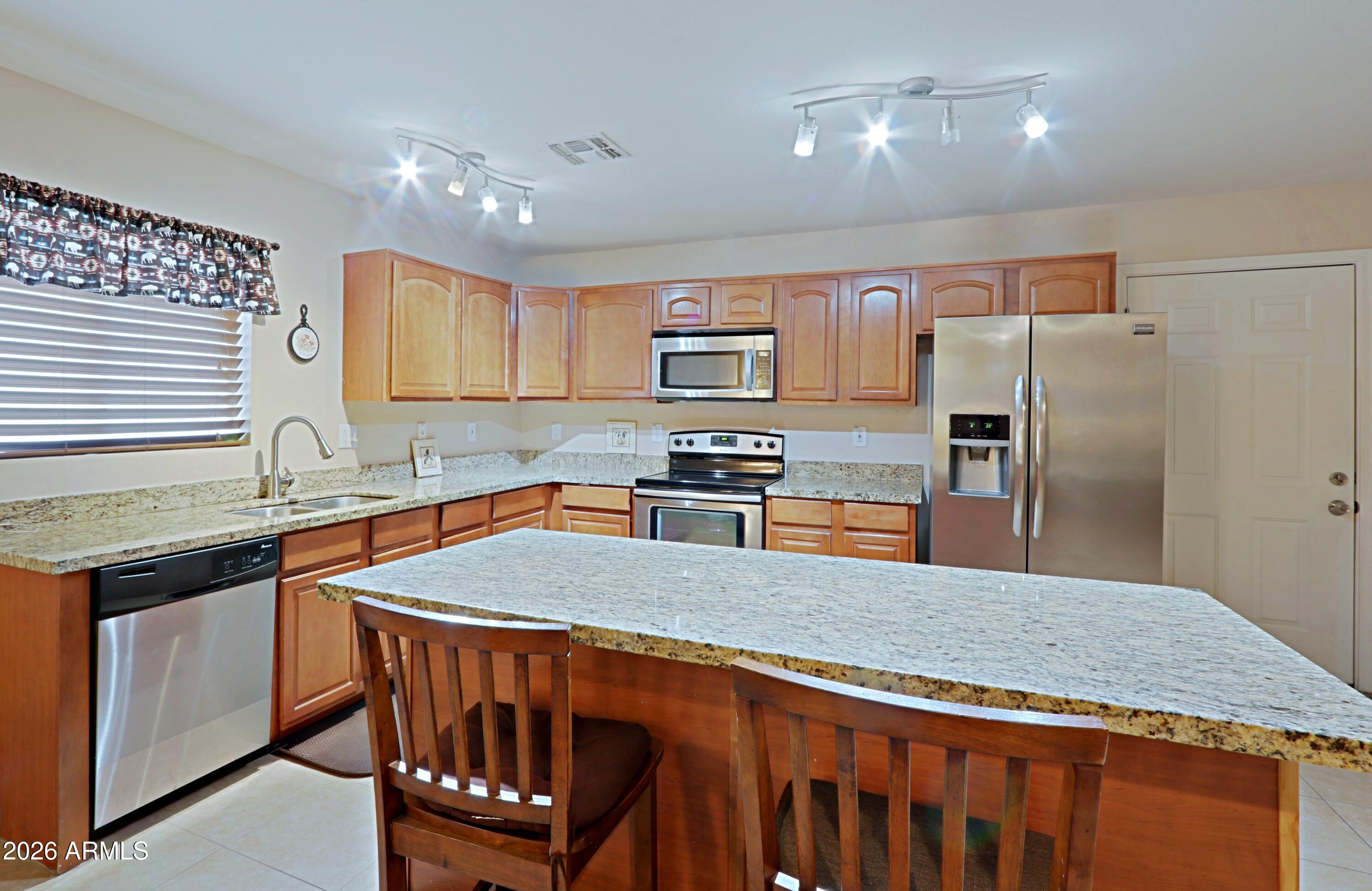 3721 West Calavar Road Phoenix, AZ 85053 - Photo 1 of 31 Kitchen island