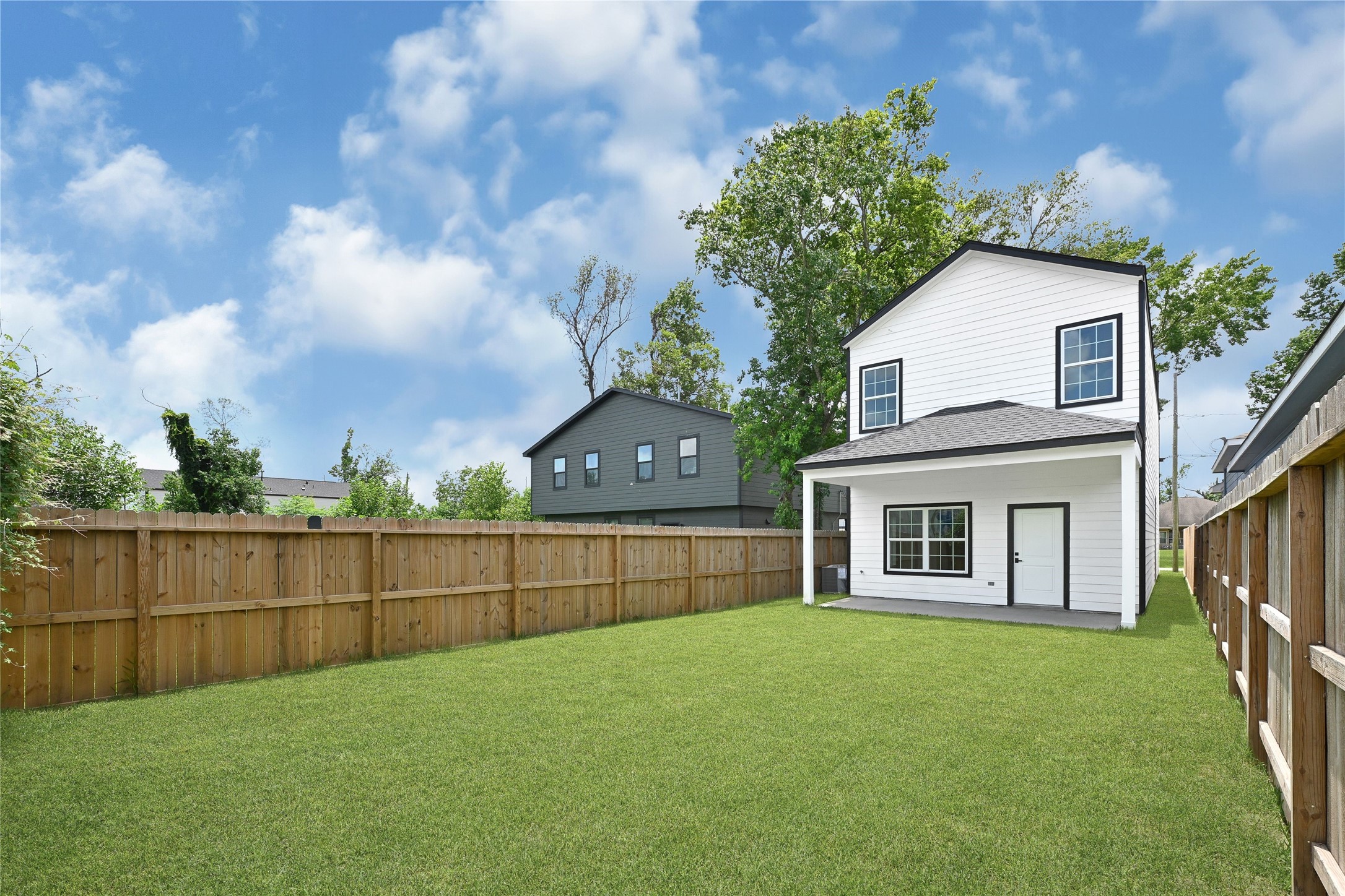 7922 Sealey Street Houston, TX 77088 - Photo 8 of 16 a view of a house with a backyard