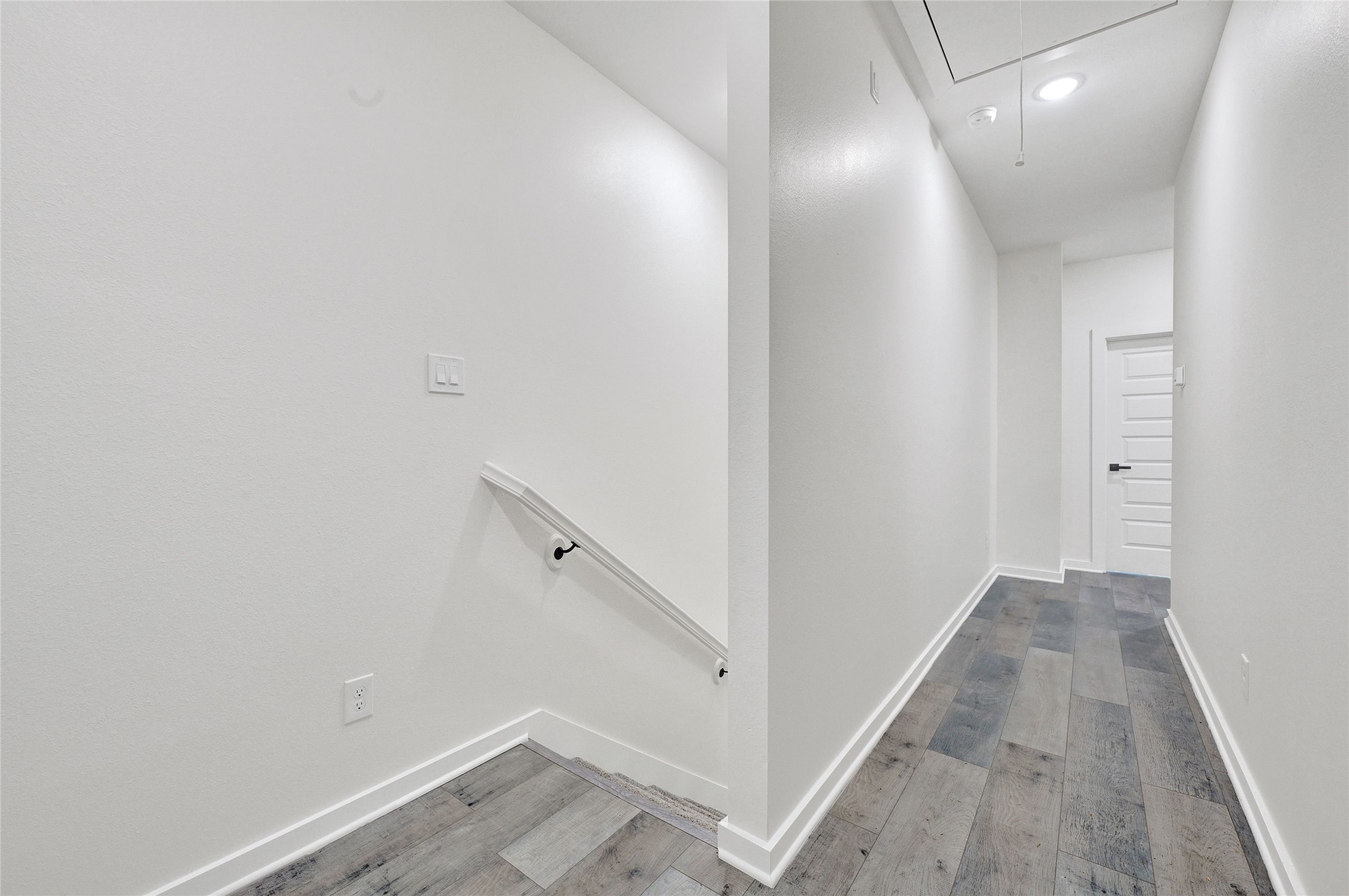 7922 Sealey Street Houston, TX 77088 - Photo 10 of 16 a view of a hallway with white walls