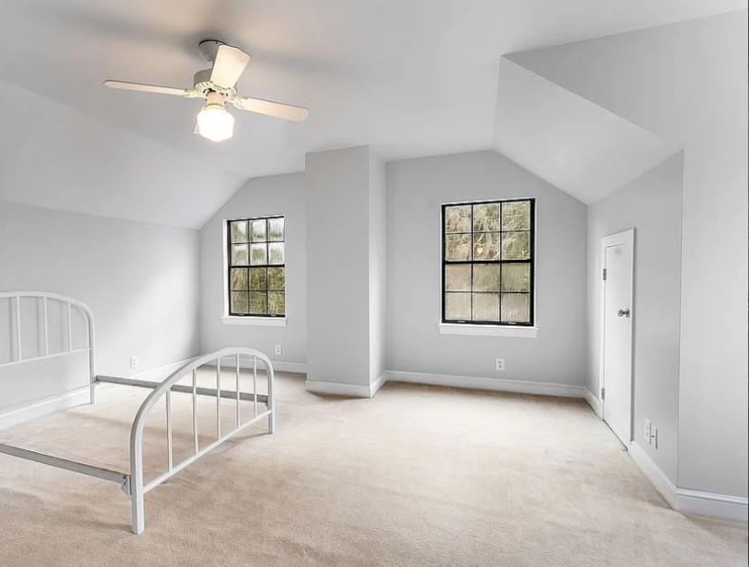 1525 Black Island Road Darien, GA 31305 - Photo 17 of 41 an empty room with windows and fan