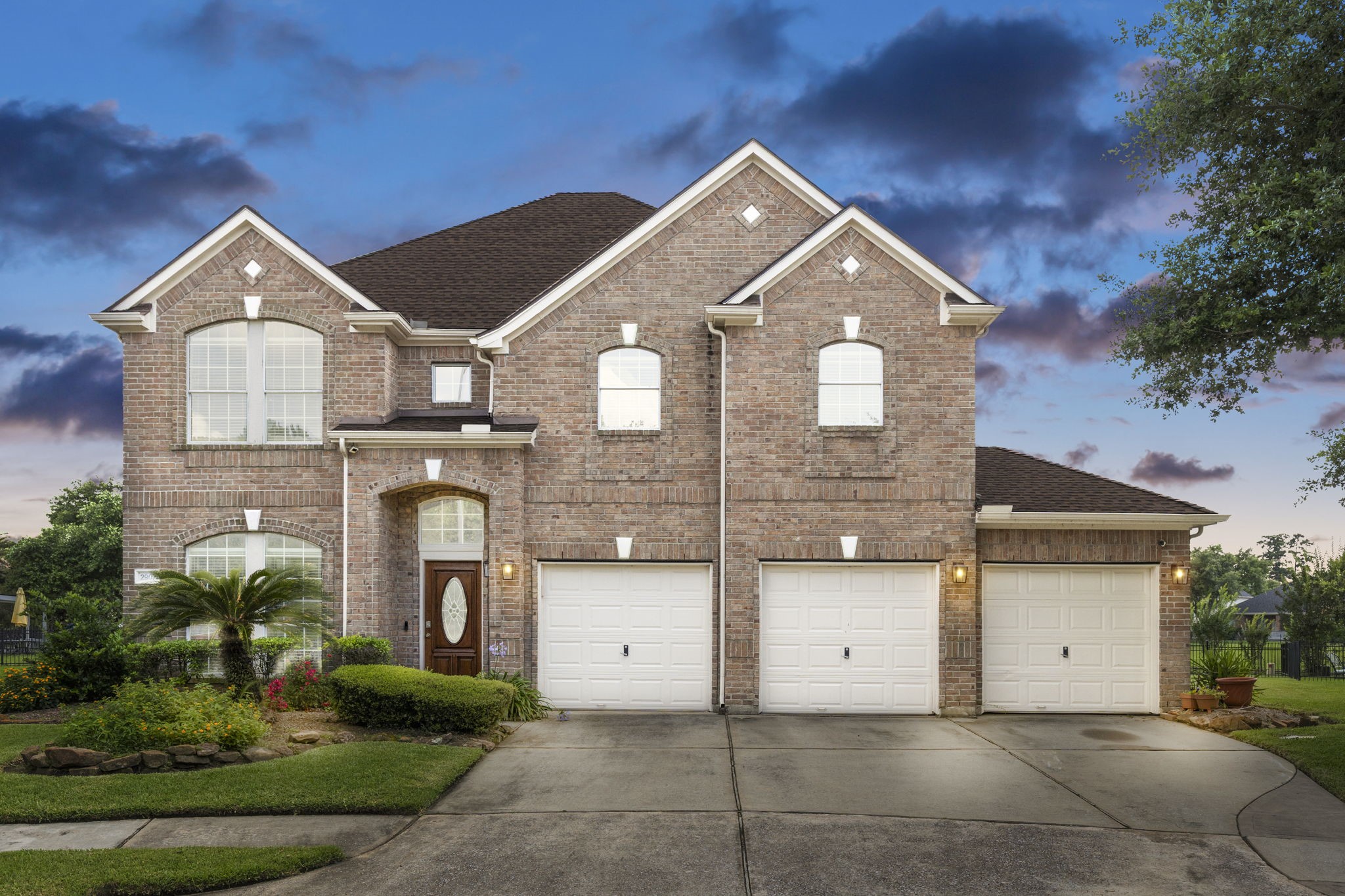 2907 Stemwood Drive Spring, TX 77388 - Photo 1 of 33 Beautiful waterfront two-story brick home with timeless curb appeal, mature landscaping, and a spacious 3-car garage in a desirable community.
