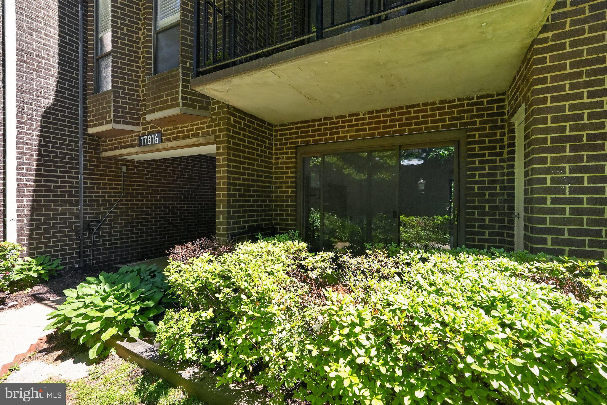 17816 Buehler Road, Unit 163 Olney, MD 20832 - Photo 13 of 17 Charming entry with lush greenery.