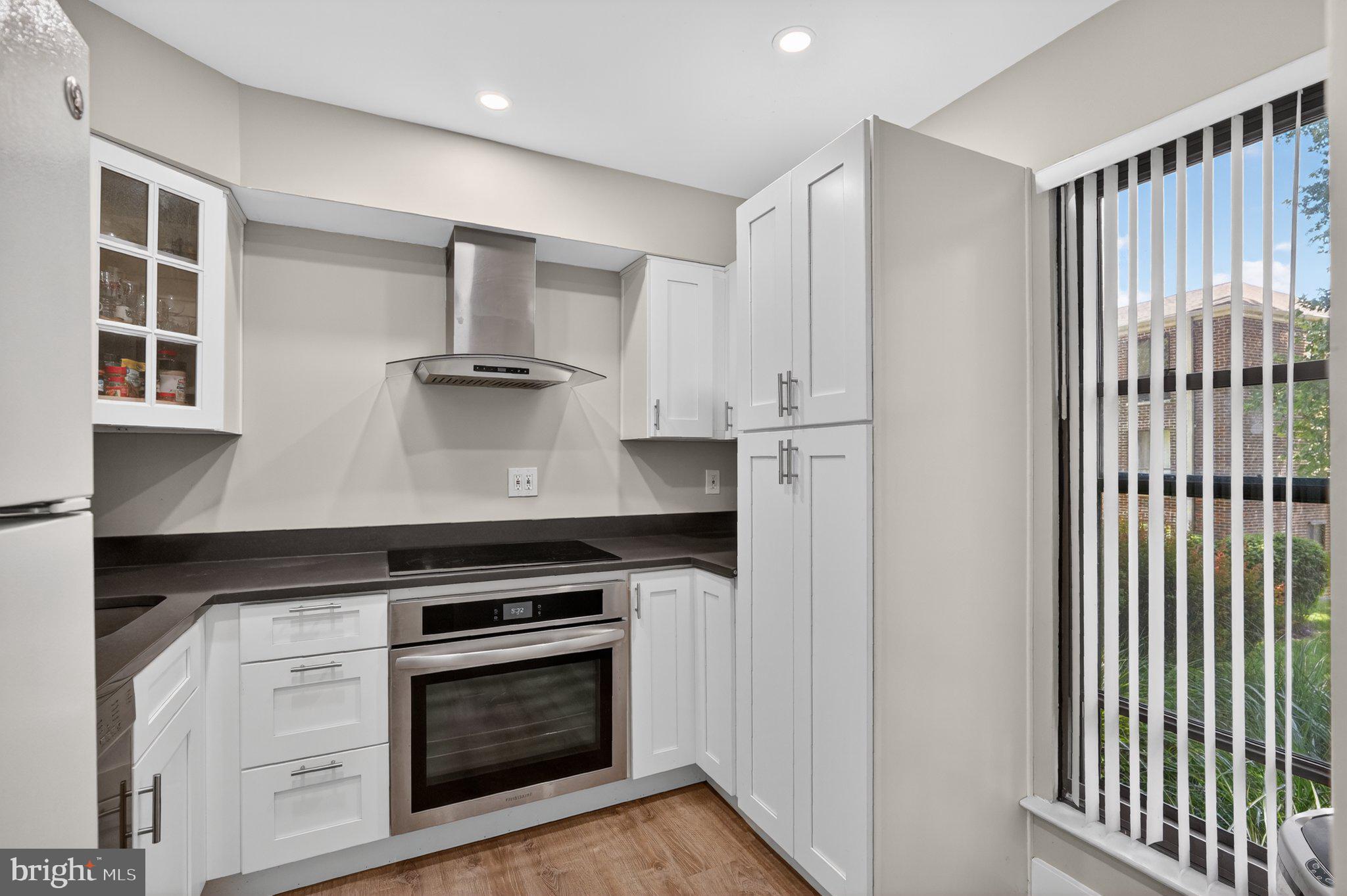 17816 Buehler Road, Unit 163 Olney, MD 20832 - Photo 2 of 17 Modern kitchen with sleek design.