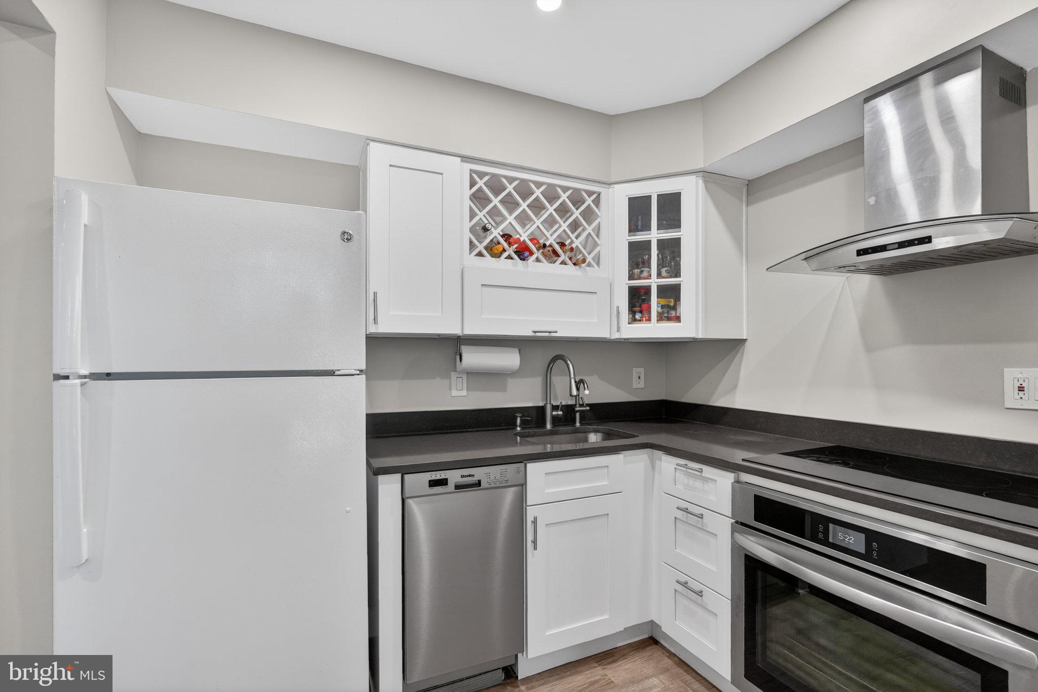 17816 Buehler Road, Unit 163 Olney, MD 20832 - Photo 3 of 17 Sleek modern kitchen with stylish finishes.