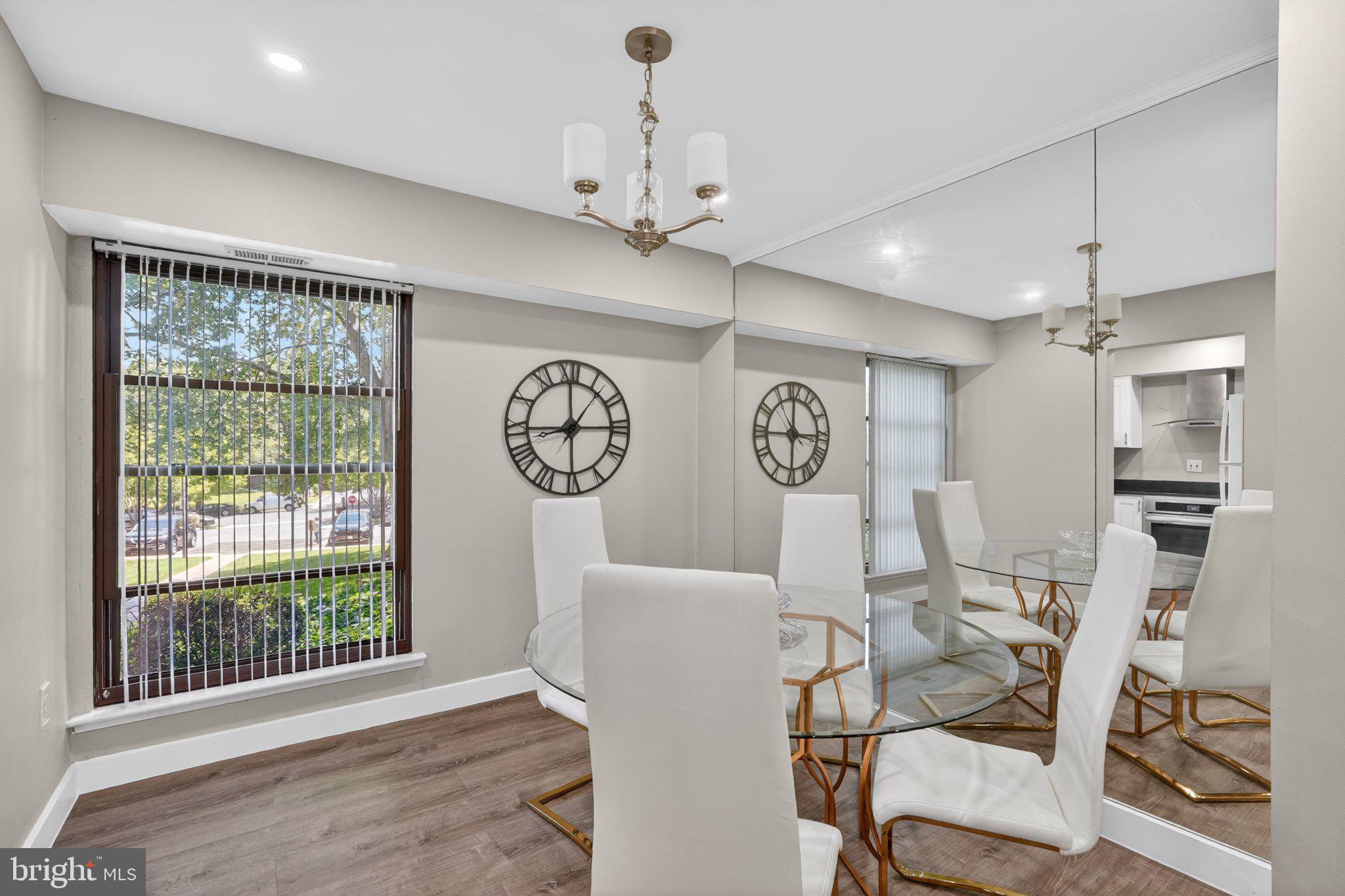 17816 Buehler Road, Unit 163 Olney, MD 20832 - Photo 6 of 17 Elegant dining space with modern flair.
