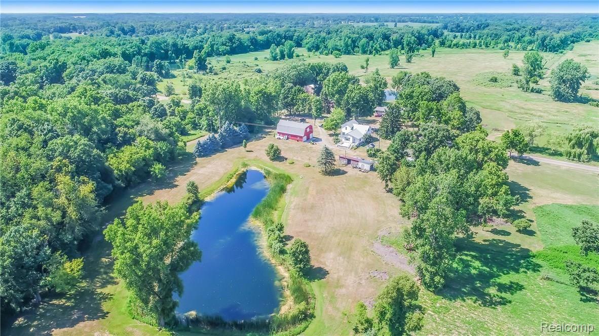 9675 Roberts Road Gregory, MI 48137 - Photo 30 of 33 Aerial photo of pond and structures.