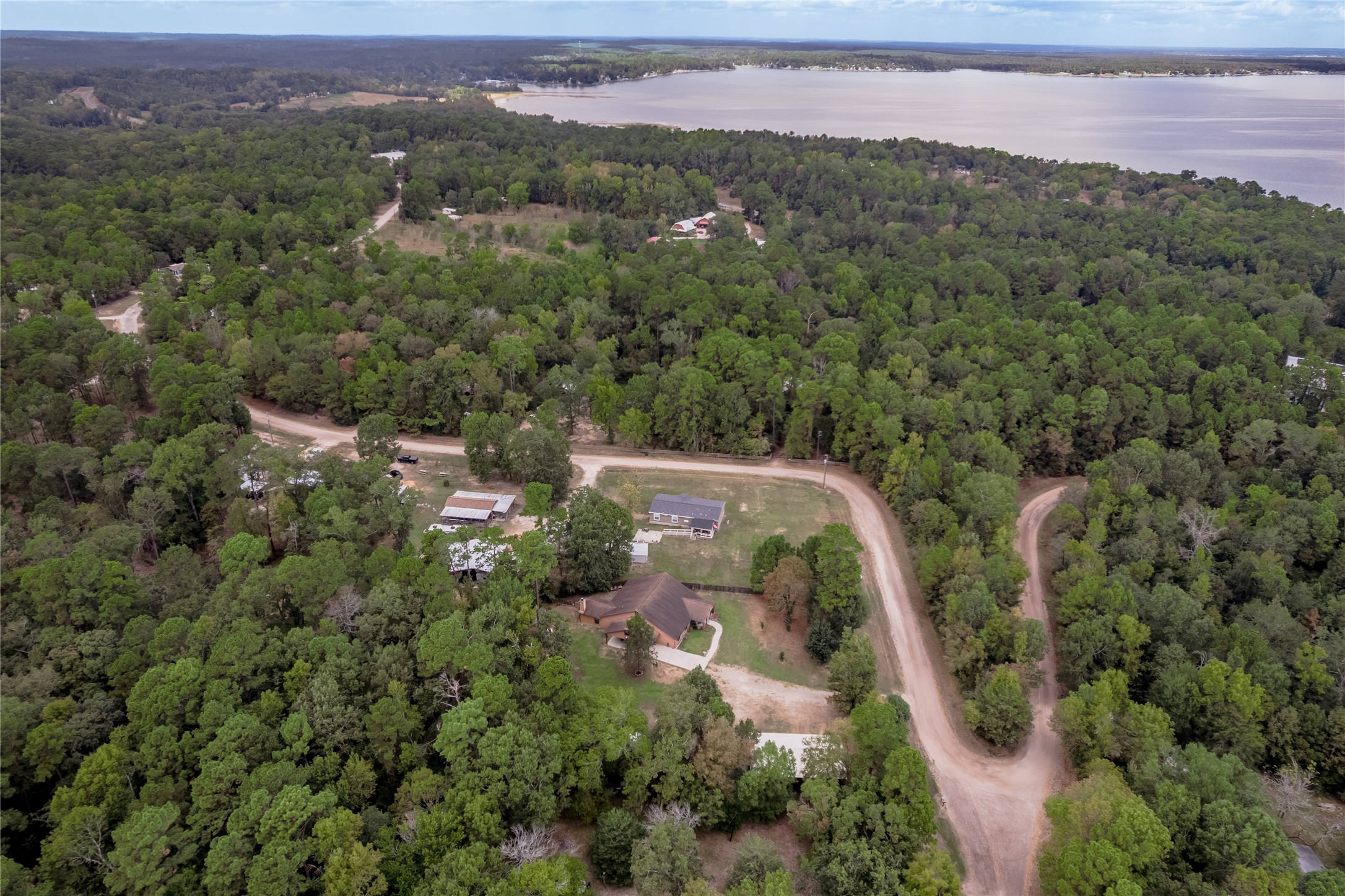 47-57 Stage Coach Road Coldspring, TX 77331 - Photo 47 of 50 an aerial view of a house with a yard