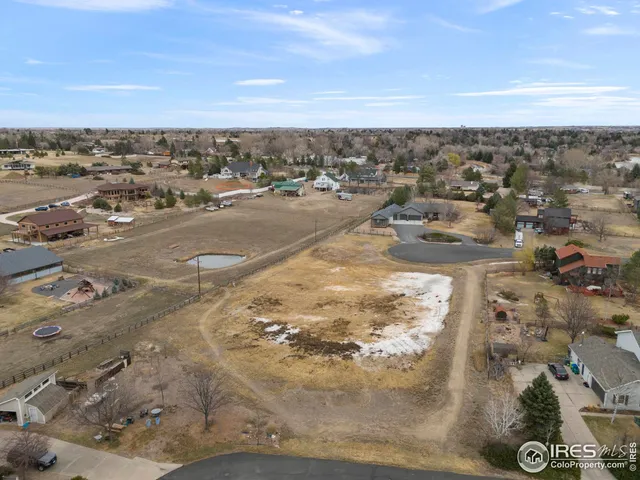 a view of a town with big yard