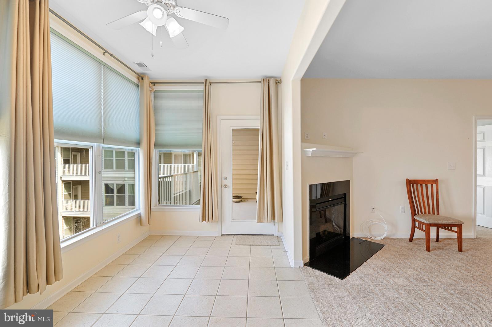 17432 Slipper Shell Way, Unit 18 Lewes, DE 19958 - Photo 7 of 32 Sunroom w/French Door to Covered Balcony