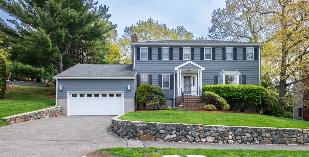 25 Ellen Road Stoneham, MA 02180 - Photo 1 of 41 a front view of a house with a yard
