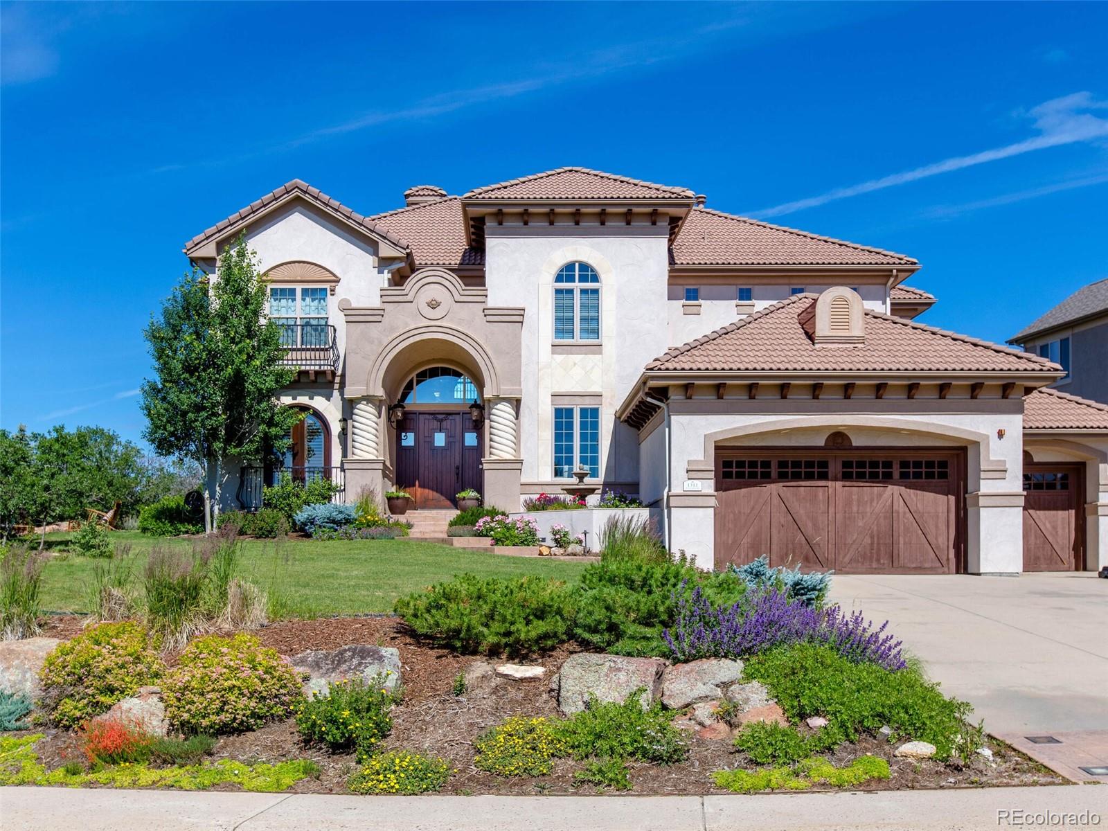 1311 Buffalo Ridge Road Castle Pines, CO 80108 - Photo 1 of 40 Gallery Image 1