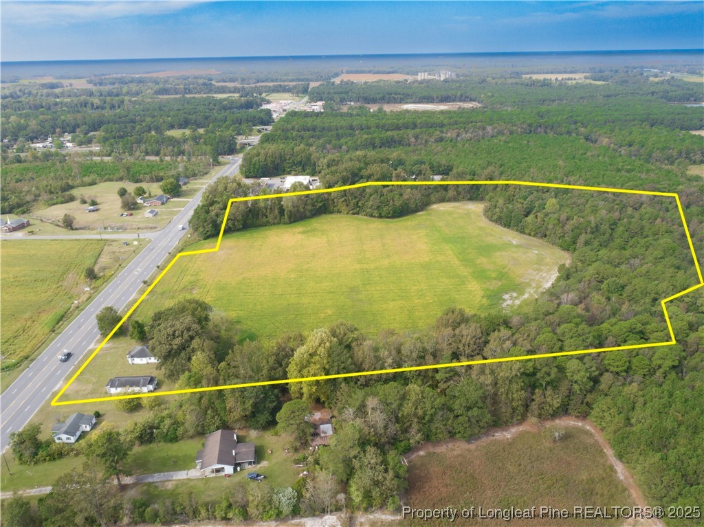 2536 Highway 24 Warsaw, NC 28398 - Photo 2 of 9 a view of a swimming pool and an outdoor seating