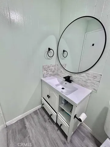 a bedroom with a bed and a walk in closet