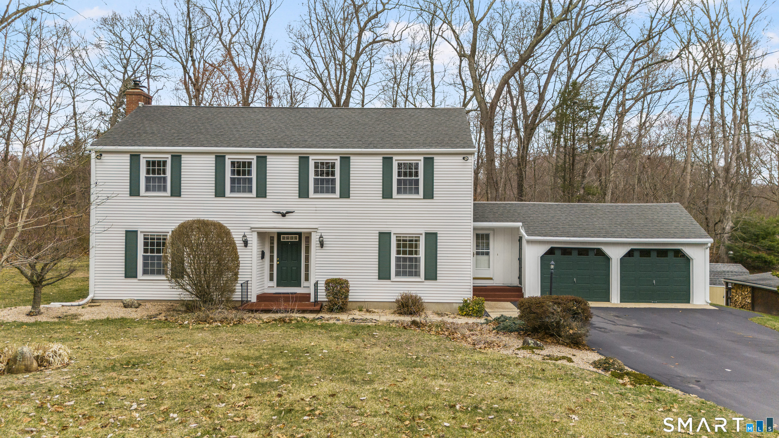 20 Inchcliffe Drive Ledyard, CT 06335 - Photo 2 of 40 a front view of a house with two yard