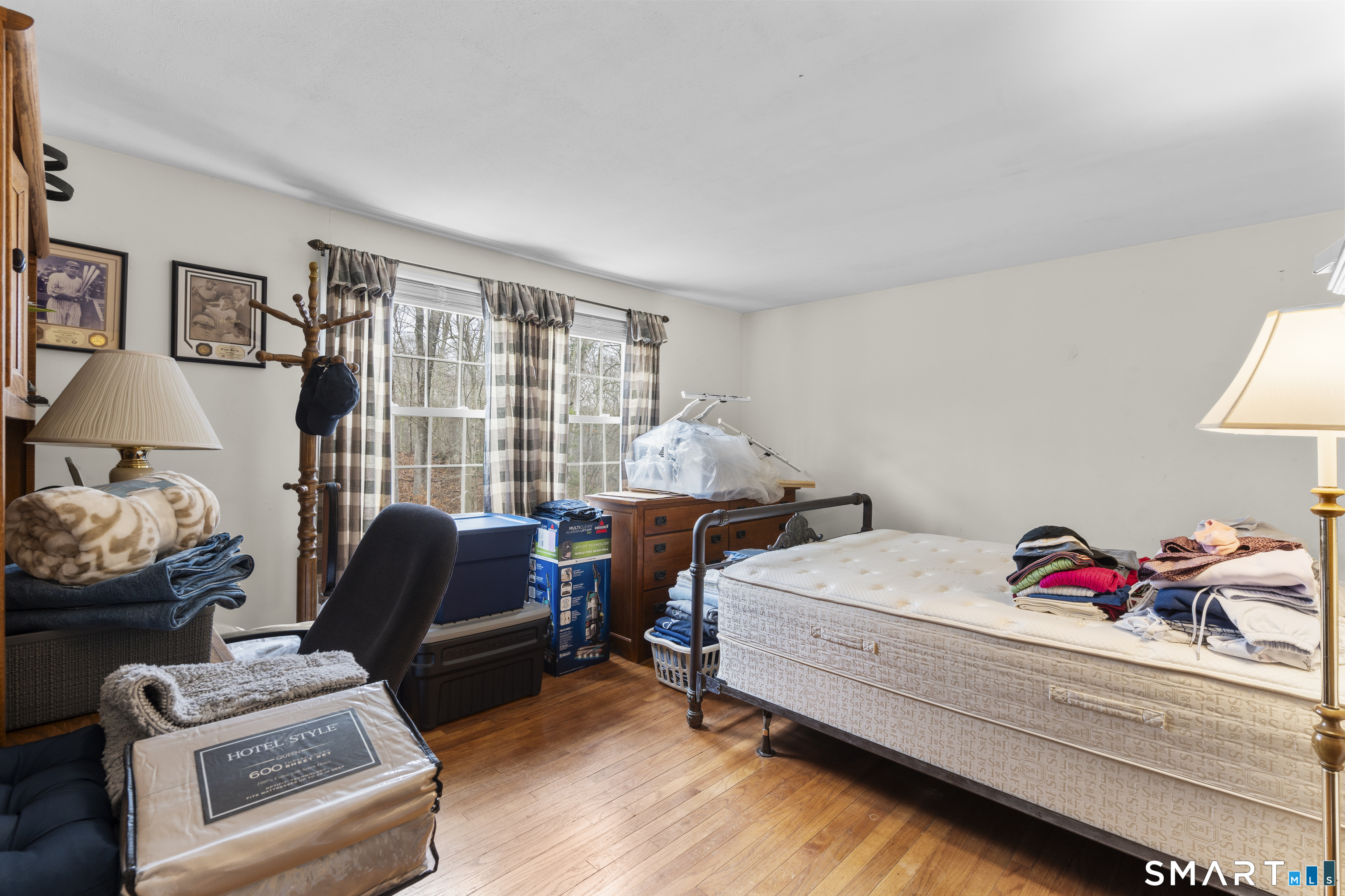 20 Inchcliffe Drive Ledyard, CT 06335 - Photo 23 of 40 a bedroom with a bed and a couch