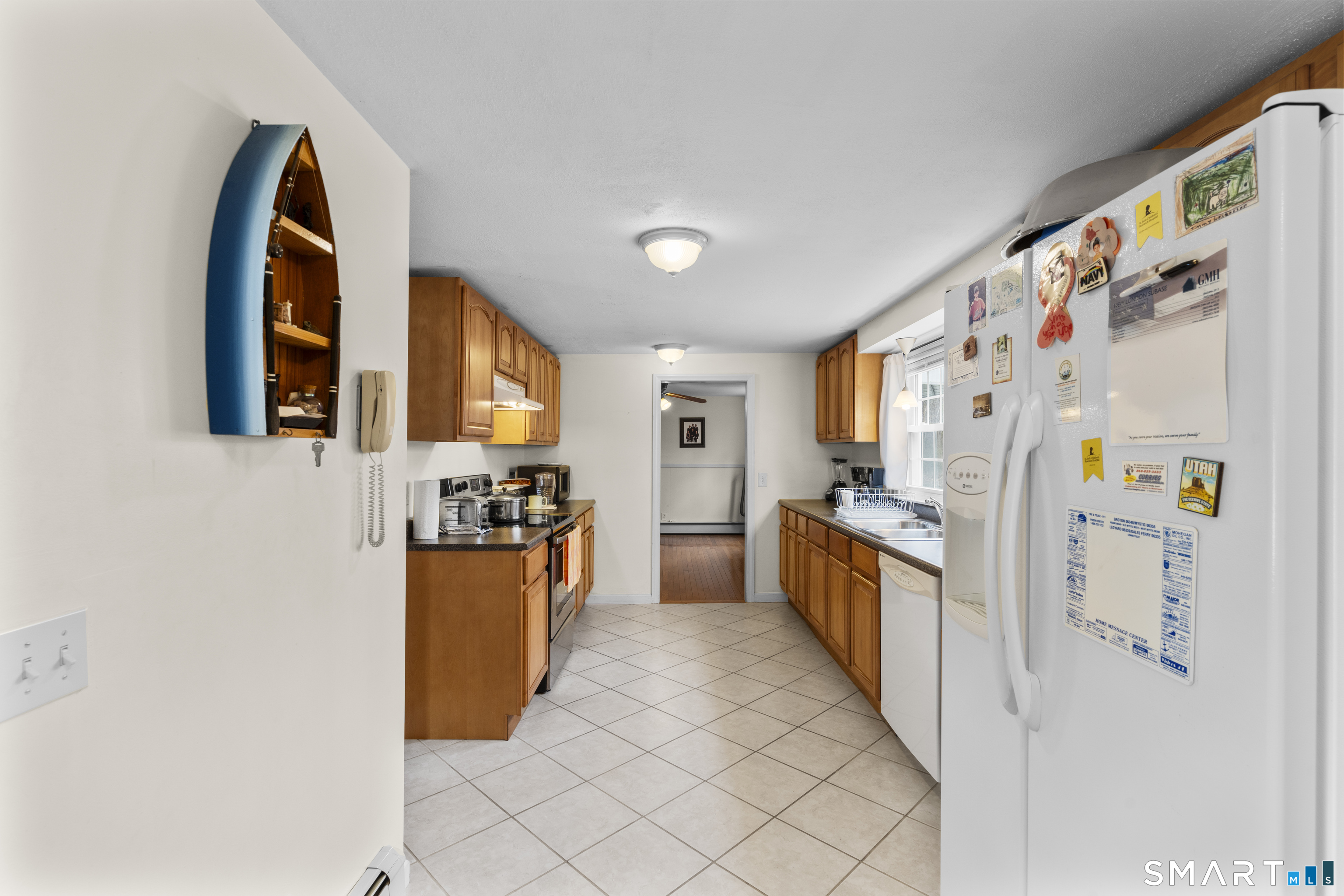20 Inchcliffe Drive Ledyard, CT 06335 - Photo 8 of 40 a kitchen with stainless steel appliances granite countertop a refrigerator and a stove