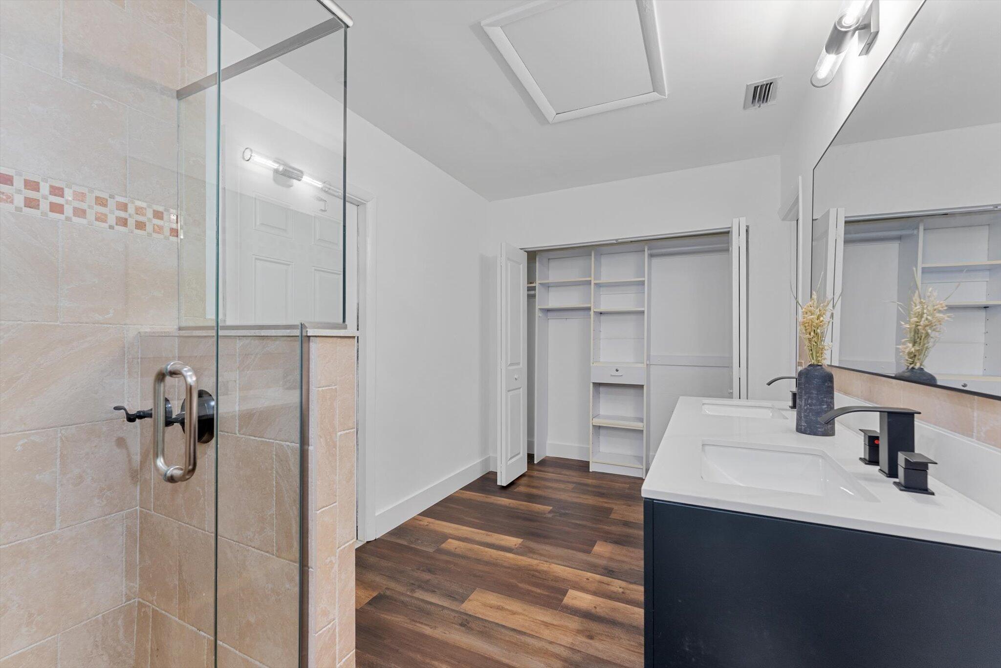 5412 Arthur Street Hollywood, FL 33021 - Photo 48 of 67 a bathroom with a sink mirror and shower