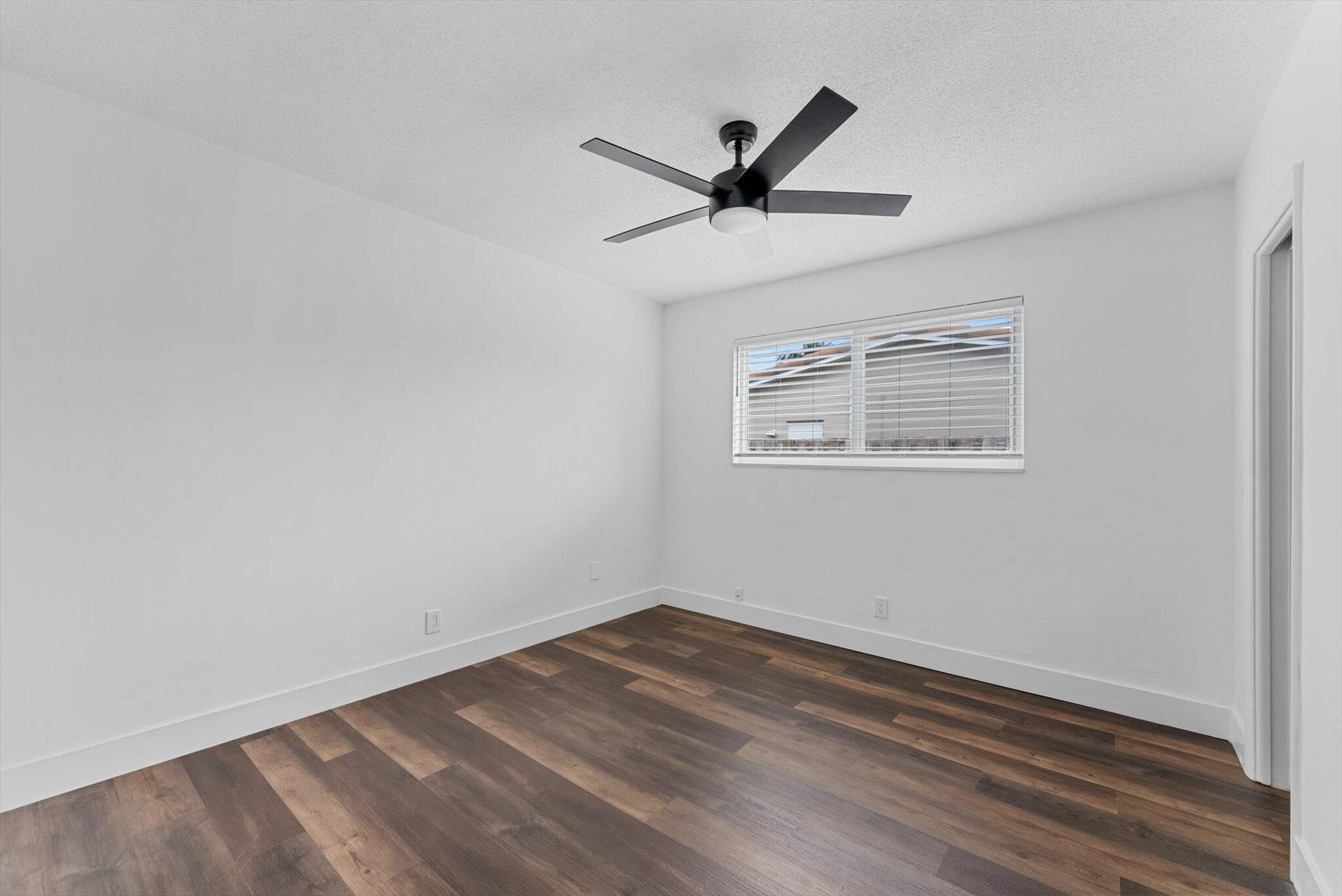 5412 Arthur Street Hollywood, FL 33021 - Photo 49 of 67 a view of a big room with wooden floor closet and windows