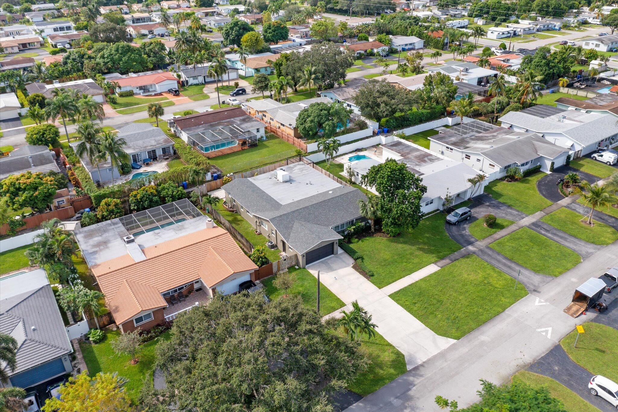 5412 Arthur Street Hollywood, FL 33021 - Photo 59 of 67 an aerial view of residential houses with outdoor space