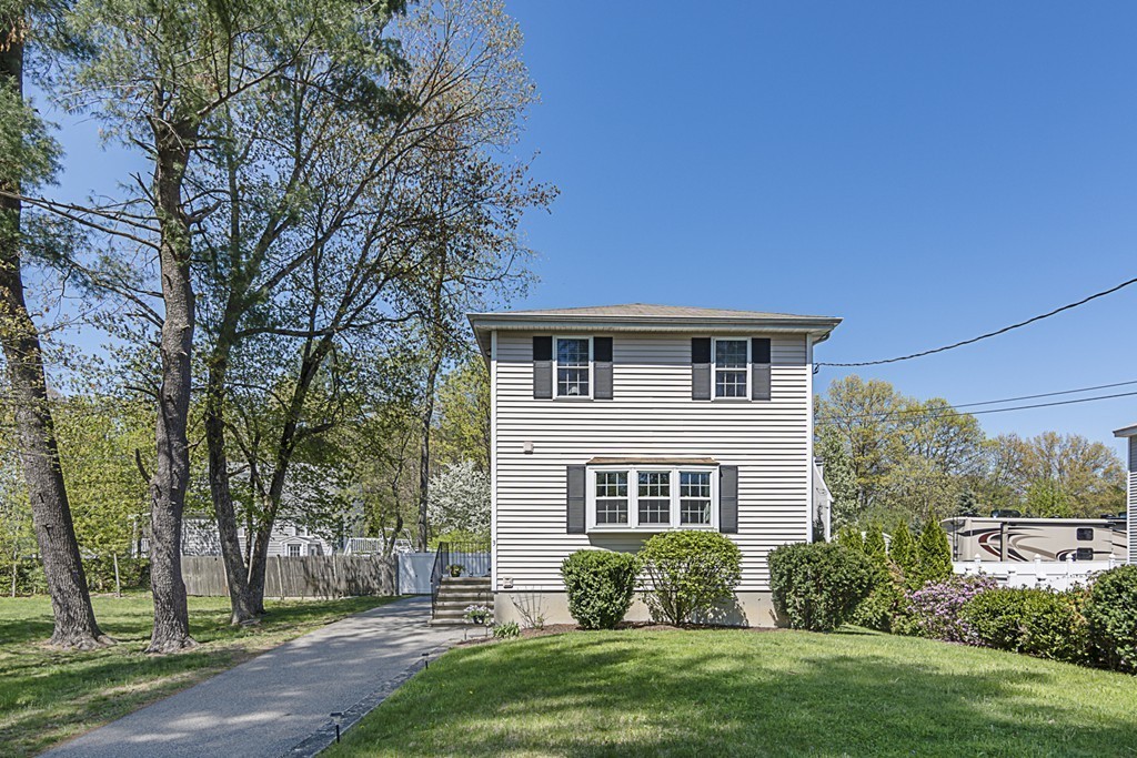 3 Bernstein Road Wilmington, MA 01887 - Photo 20 of 20 front view of a house with a yard