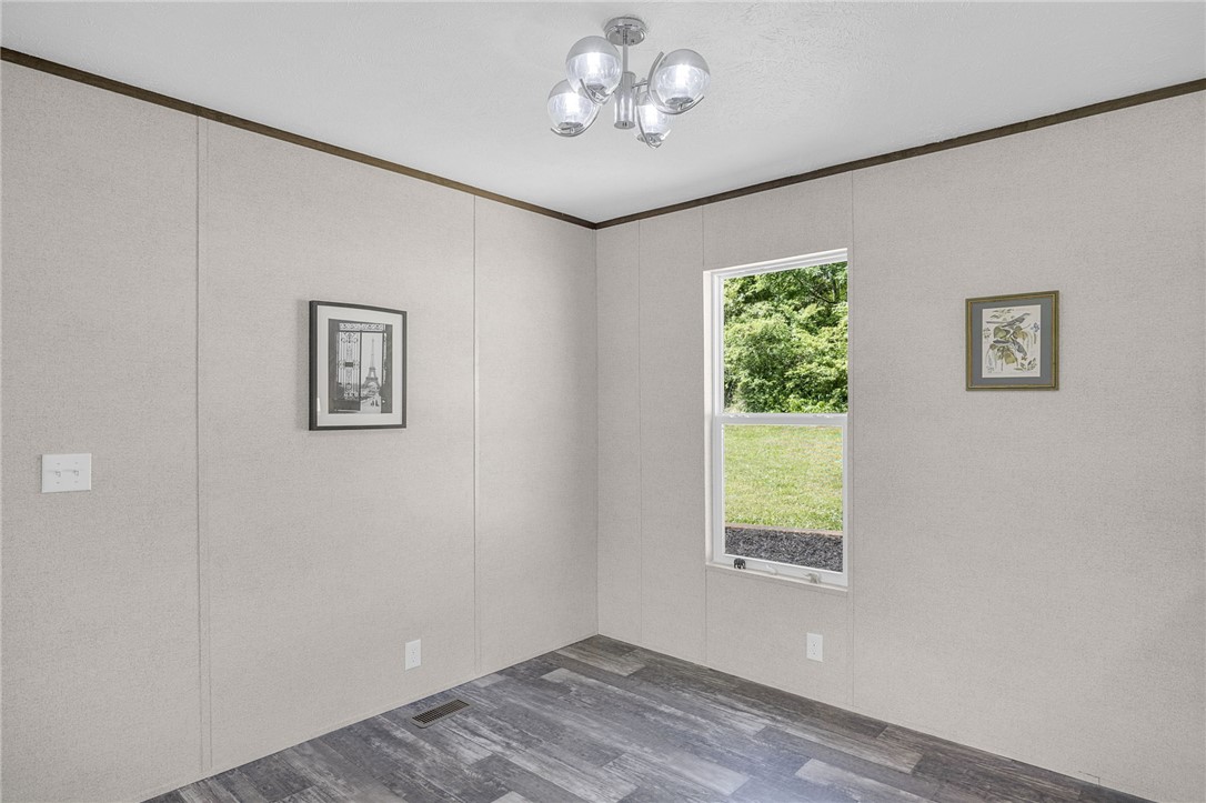 375 Griggs Road Six Mile, SC 29682 - Photo 14 of 36 This versatile room features durable flooring and a bright window, ready for your personal touch.