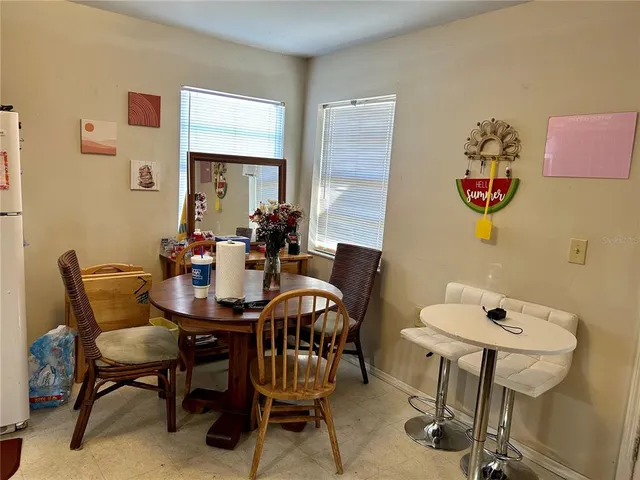 a view of a dining room with furniture