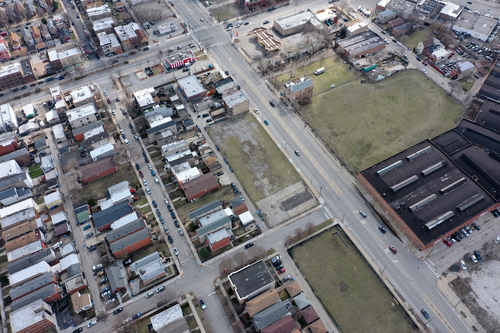2432-2458 West Roosevelt Road Chicago, IL 60608 - Photo 9 of 18 an aerial view of a residential apartment building with a yard
