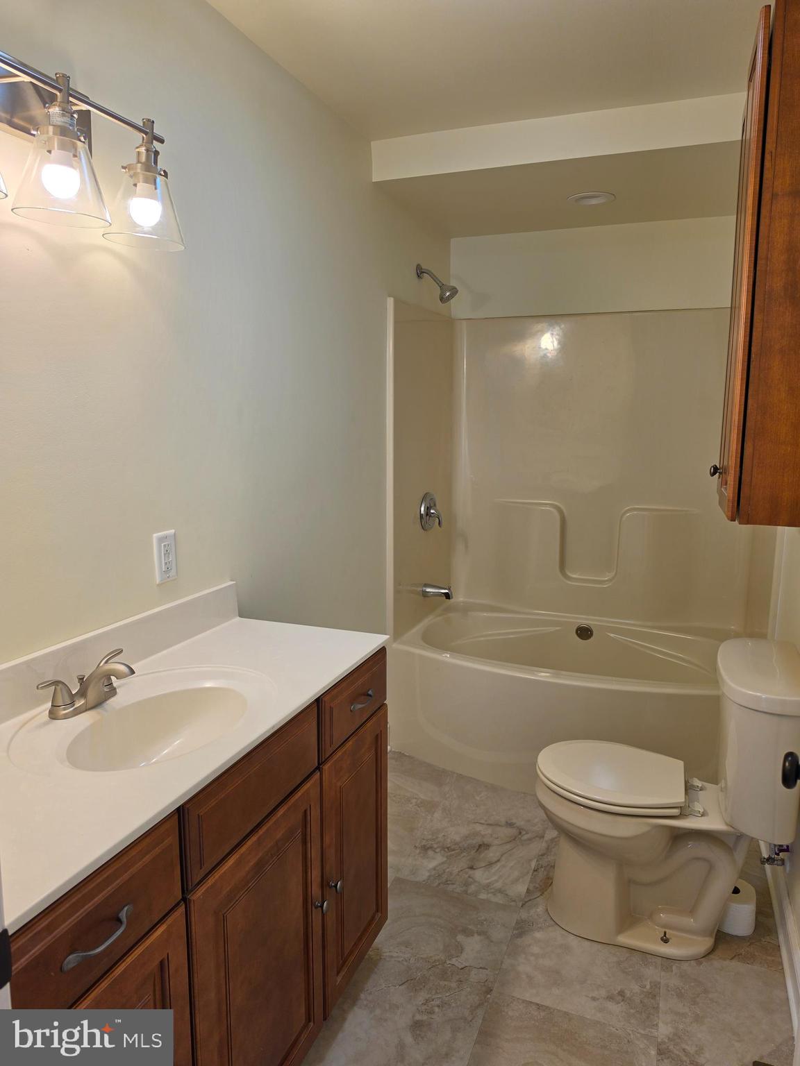 13514 Old Cresaptown Road Southwest Lavale, MD 21502 - Photo 18 of 25 a bathroom with a sink a toilet and shower