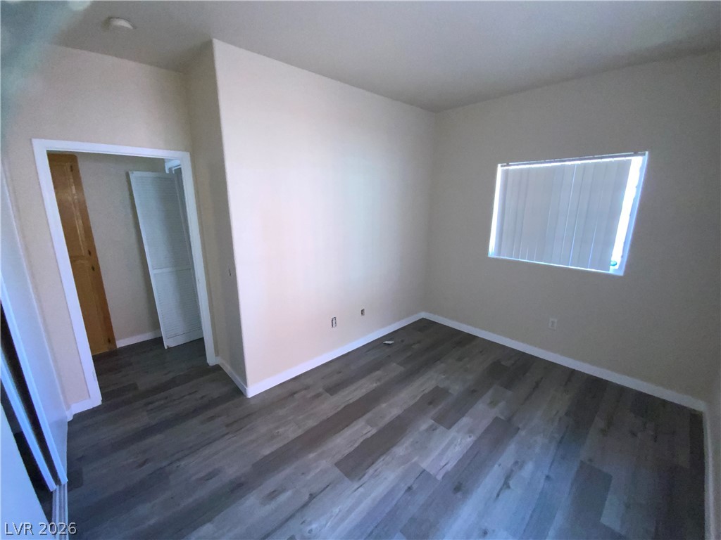 4730 East Craig Road, Unit 1154 Las Vegas, NV 89115 - Photo 10 of 13 Well-lit interior space with fresh flooring awaits your personal touch.