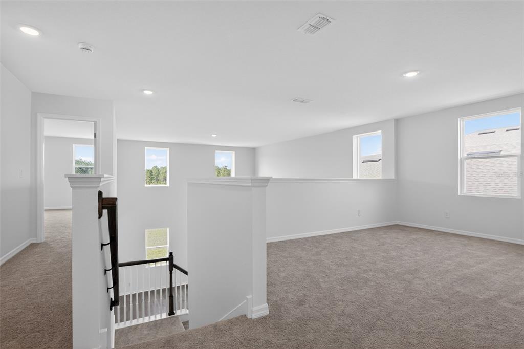 5788 Haystack Drive St. Cloud, FL 34771 - Photo 19 of 31 a view of an empty room with a window