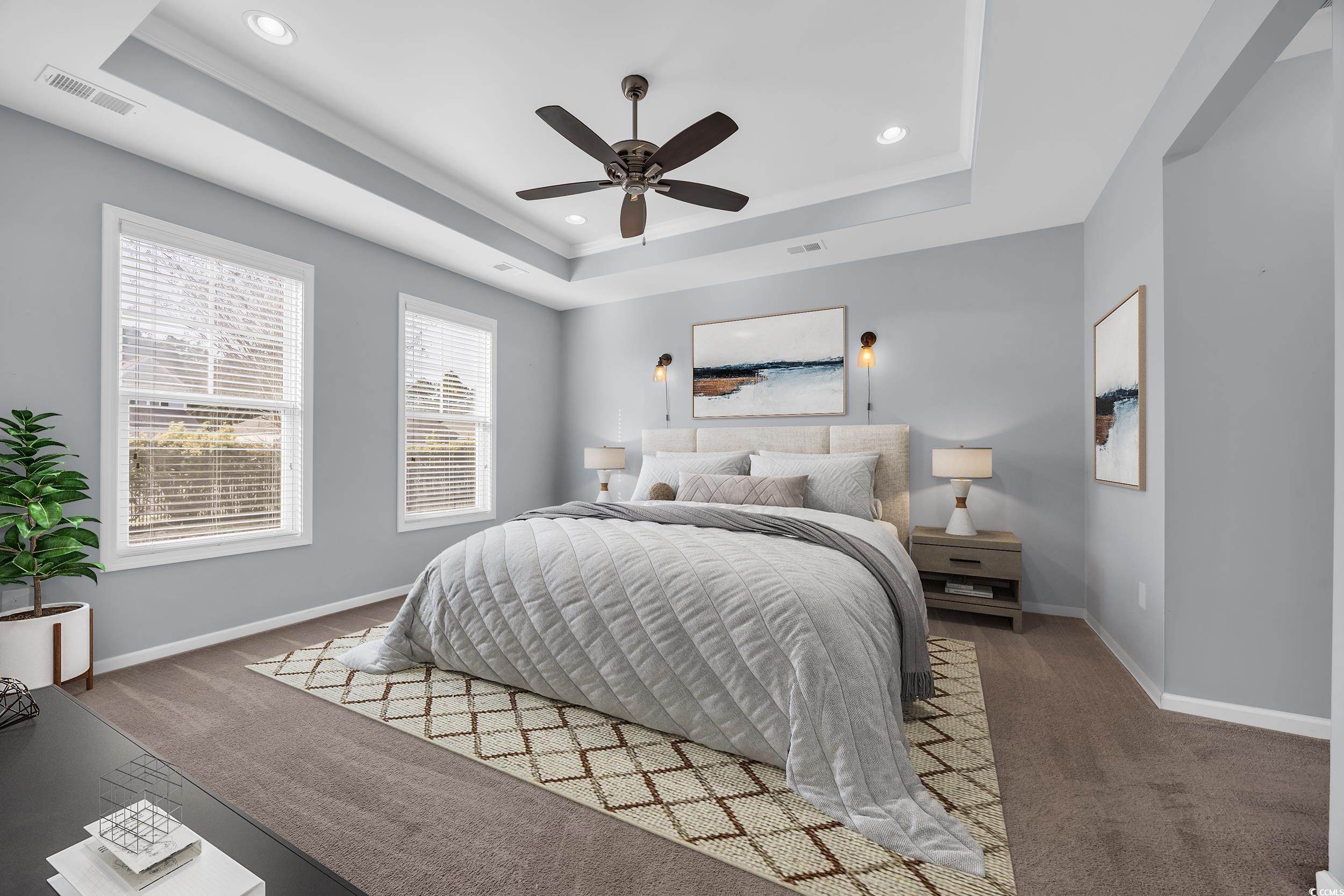 351 Firenze Loop Myrtle Beach, SC 29579 - Photo 14 of 37 Bedroom with recessed lighting, a tray ceiling, ba