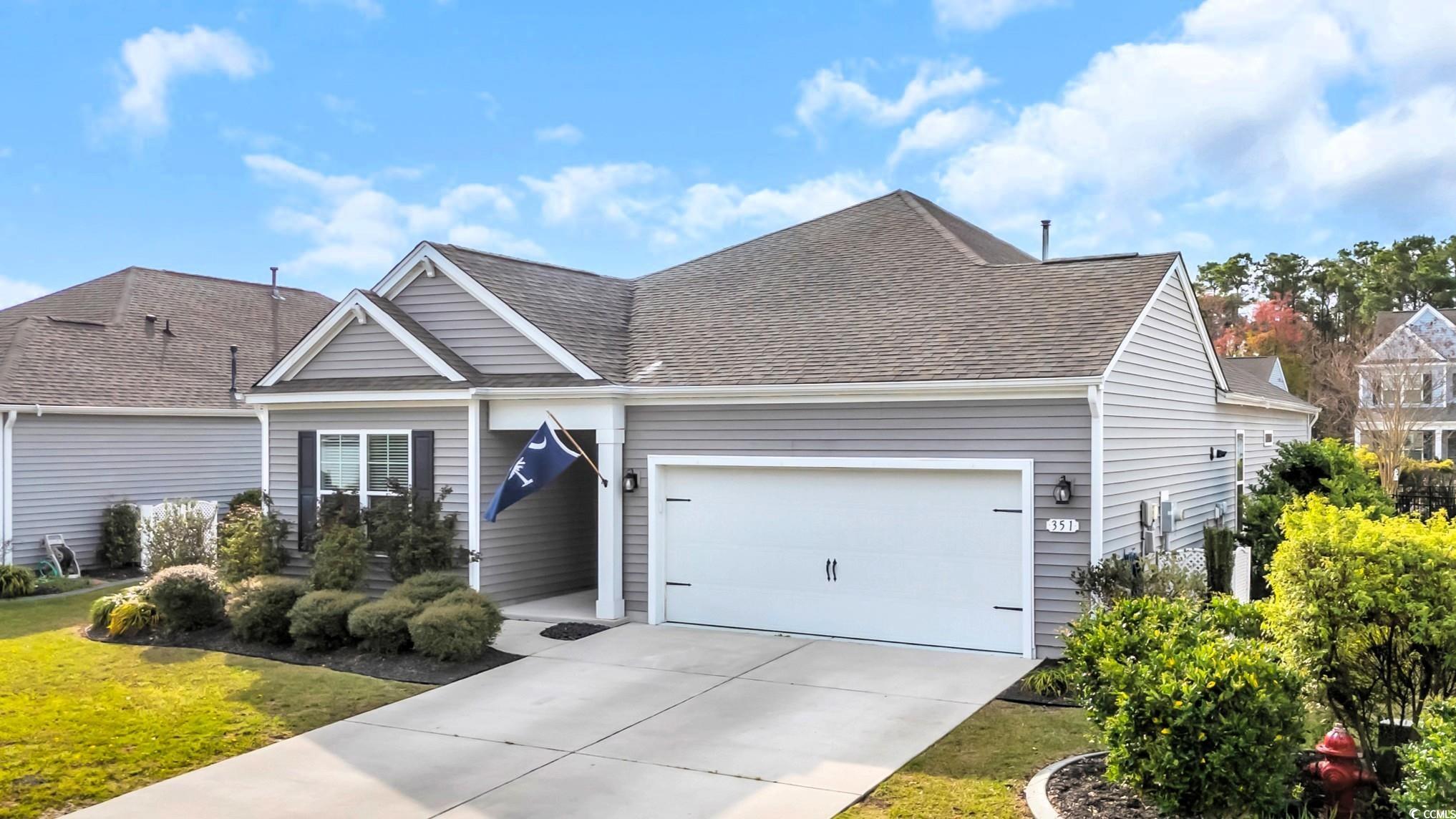 351 Firenze Loop Myrtle Beach, SC 29579 - Photo 2 of 37 View of front of property featuring driveway, a sh