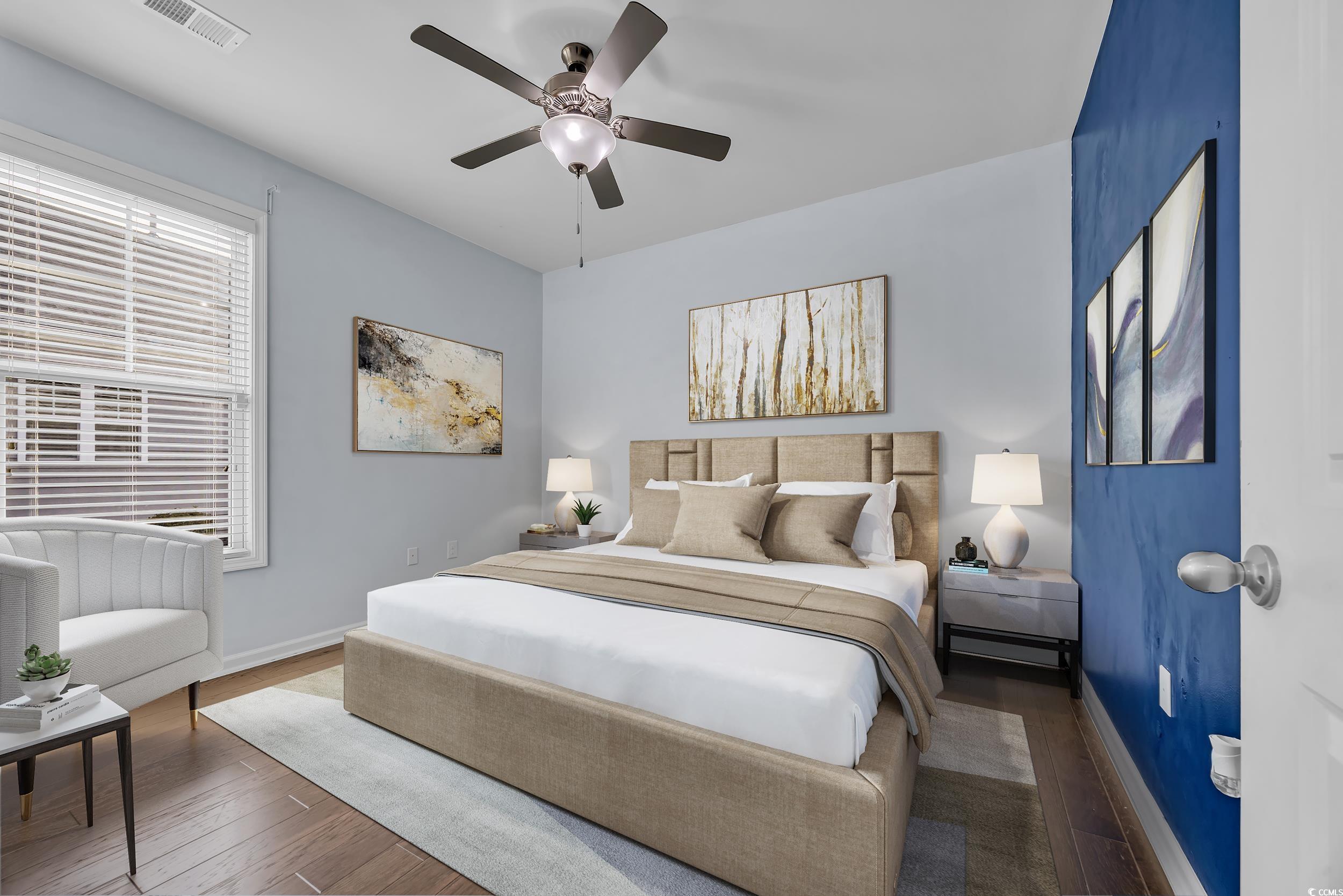 351 Firenze Loop Myrtle Beach, SC 29579 - Photo 21 of 37 Bedroom featuring a ceiling fan, wood finished flo