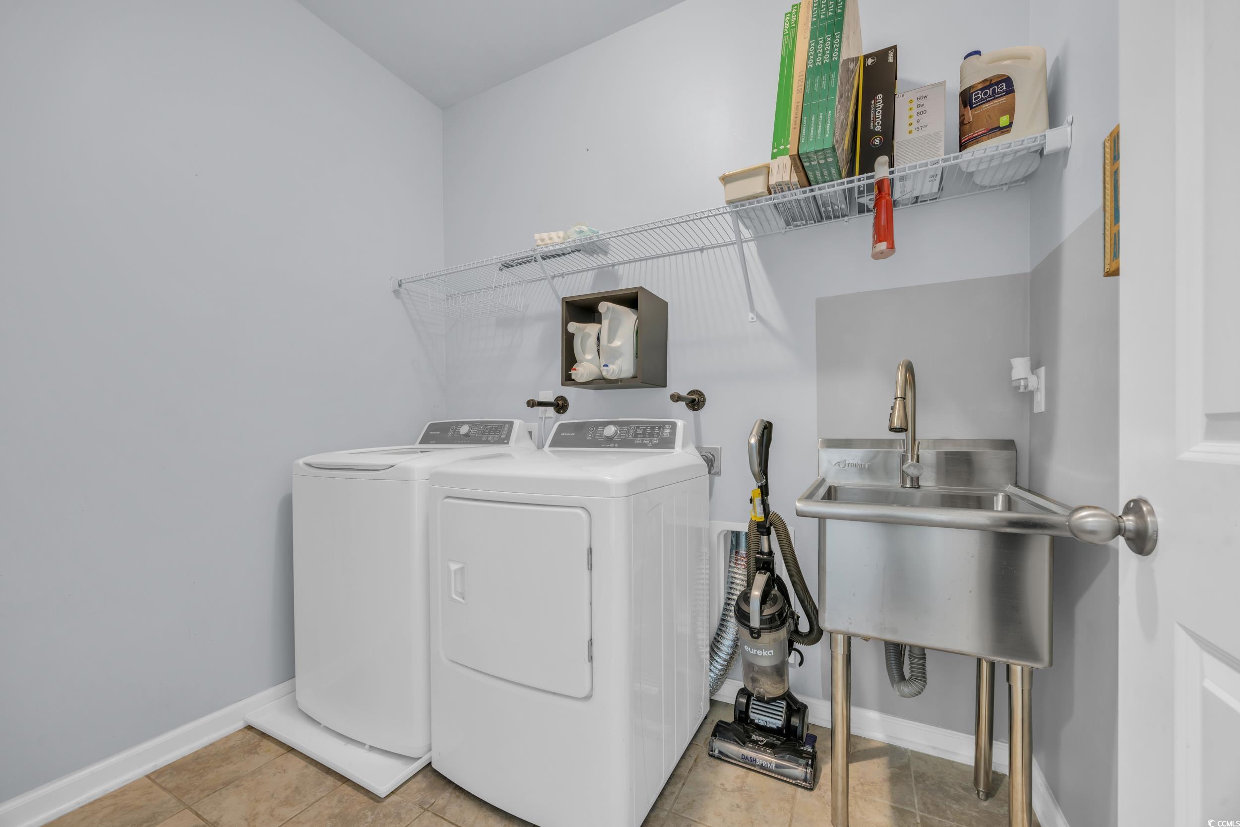 351 Firenze Loop Myrtle Beach, SC 29579 - Photo 26 of 37 Laundry room with a sink, laundry area, light tile