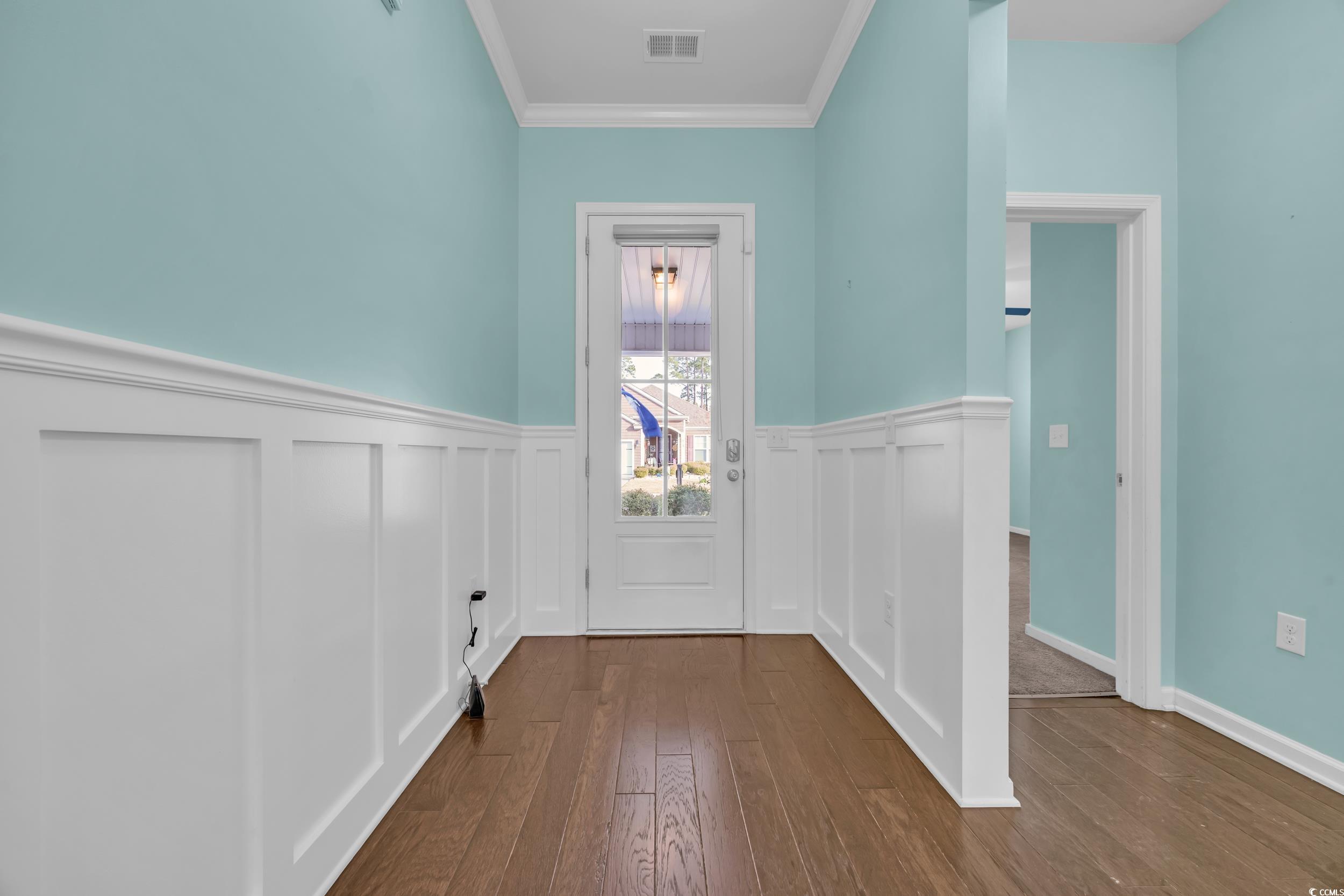 351 Firenze Loop Myrtle Beach, SC 29579 - Photo 3 of 37 Doorway with dark wood-style floors, visible vents