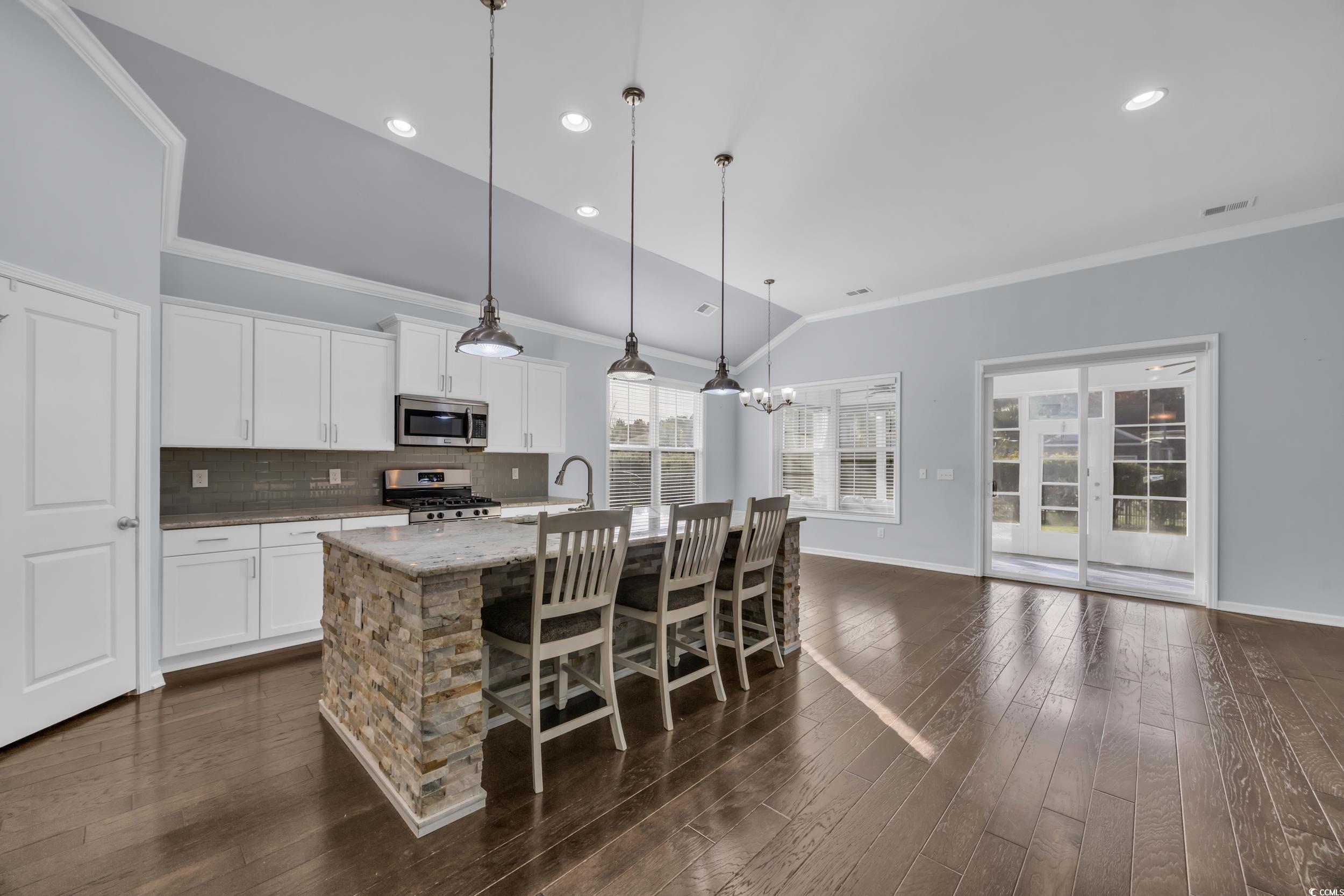 351 Firenze Loop Myrtle Beach, SC 29579 - Photo 9 of 37 Kitchen with vaulted ceiling, stainless steel appl